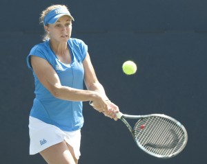 Freshman Catherine Harrison helped UCLA clinch a 4-1 win over North Carolina, earning a spot in the NCAA semifinals today against Texas A&M.