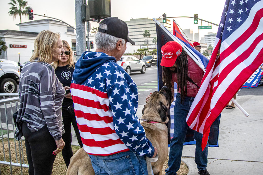 At a pro-Trump rally in Beverly Gardens Park, a demonstrator brought his furry friend along to the delight of several demonstrators, who paused their chanting slogans and waving flags to greet the dog.