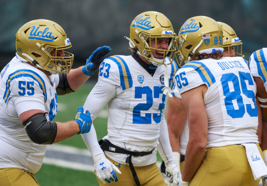 Redshirt sophomore tight end Greg Dulcich celebrates with his teammates in the end zone after catching a touchdown. Dulcich's touchdown was the only receiving touchdown of the day for UCLA.