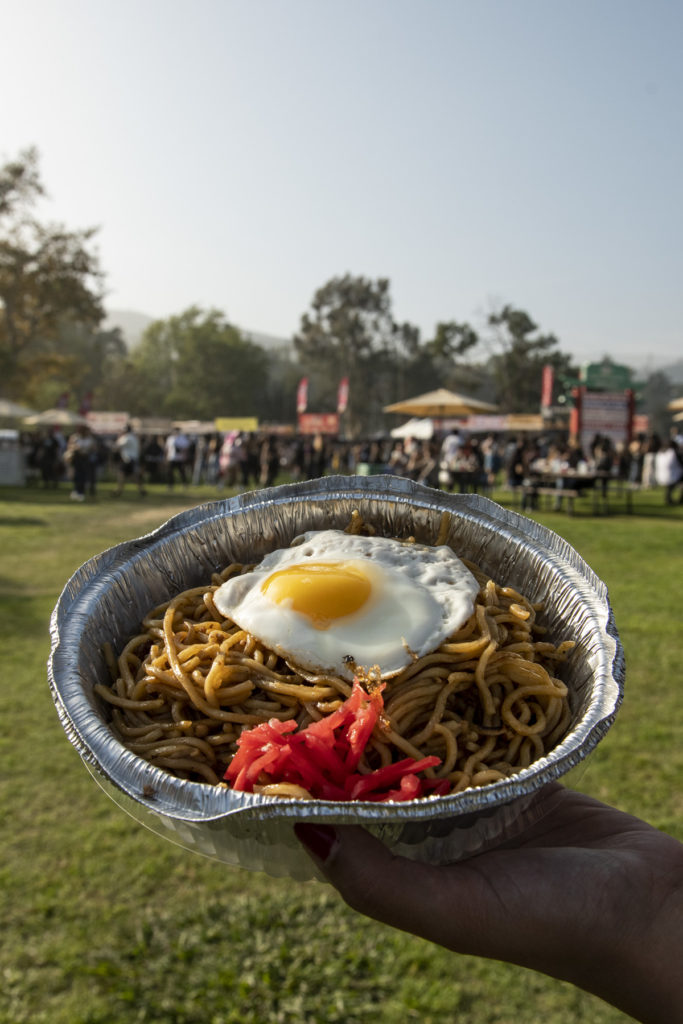 With staples such as Japanese street food dish of noodles, fried egg and pickled ginger named Yakisoba, the vendors boasted a wide variety of food fit for the festival. (Alex Driscoll/Daily Bruin staff)