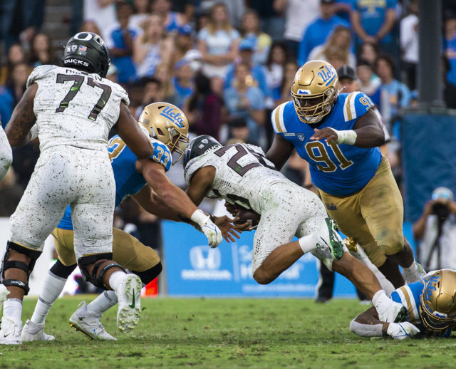 UCLA DT Otito Ogbonnia joins Chargers after manifestation – Orange County  Register