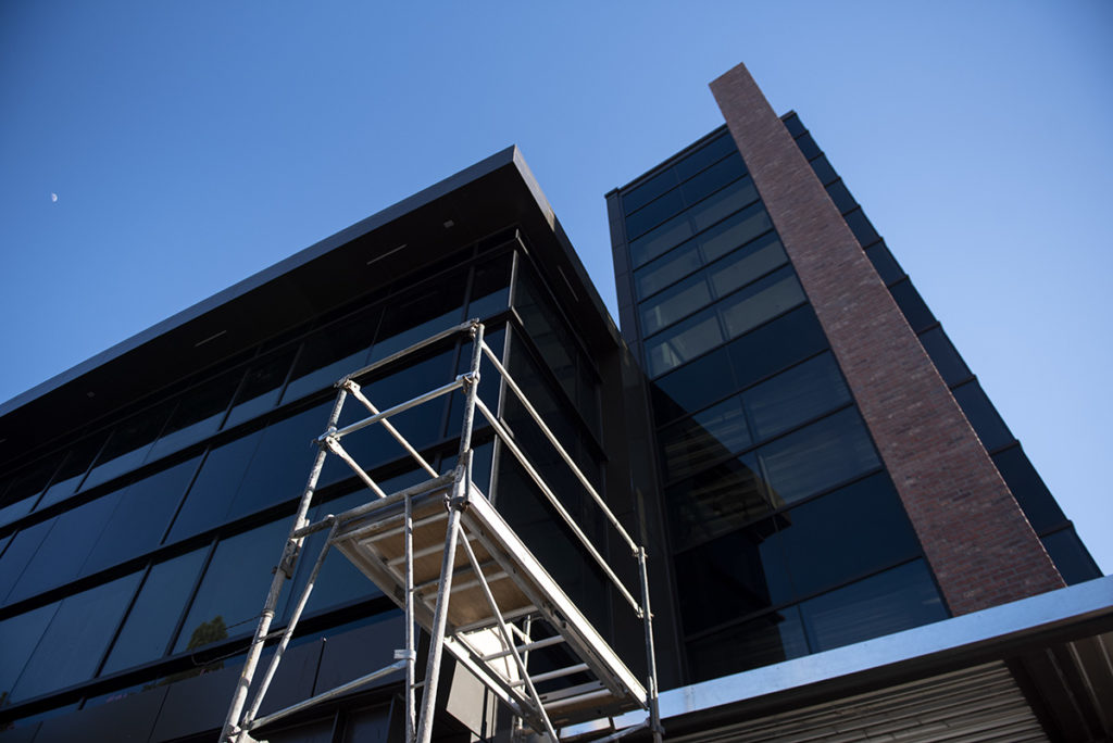 Pictured is the ongoing construction across from Westwood's Chevron gas stations. While new construction helps expand campus, the noise that comes with it can pose its own set of problems. (Ariana Fadel/Daily Bruin staff)