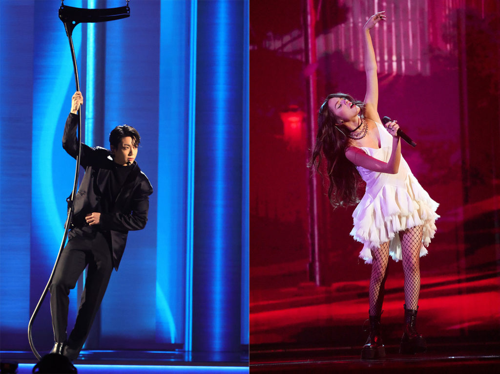 BTS member Jungkook (left) descends onto the stage via spy rope, setting the mood for a James Bond-esque rendition of nominated song “Butter.” Rodrigo (right) sings "drivers license" on the stage with fishnet tights and a black choker necklace paired with a ruffled white dress. Both performances incorporated elaborate sets connecting to their songs’ narrative threads. (Courtesy of Getty Images for The Recording Academy)