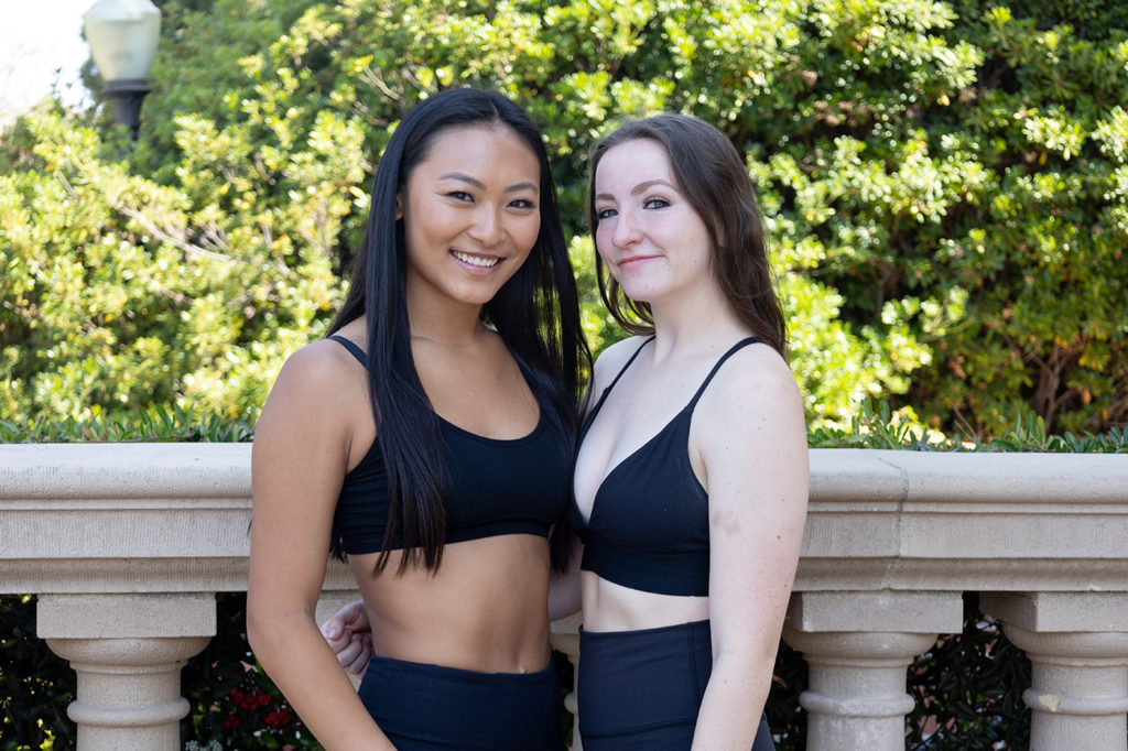 Choi (left) and O’Rourke (right) stand side by side and smile. Icarus Contemporary's Spring Sing appearance will feature more of its dancers than typical performances, a decision made to heighten the theme of community, O'Rourke said. (Neha Krishnakumar/Daily Bruin)