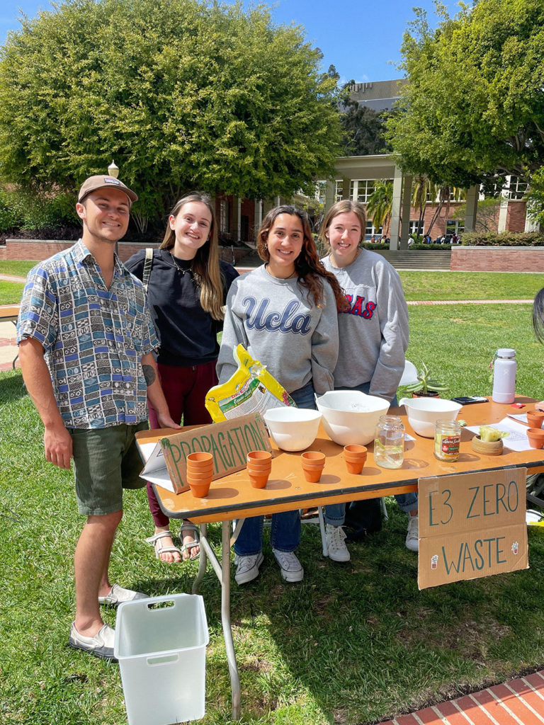 Members of E3 help table at the Earth Day Fair at UCLA. Organizations like E3 help students learn about sustainable practices and foster hands-on activities to help build a better planet. (Courtesy of Daria di Blasi/E3)