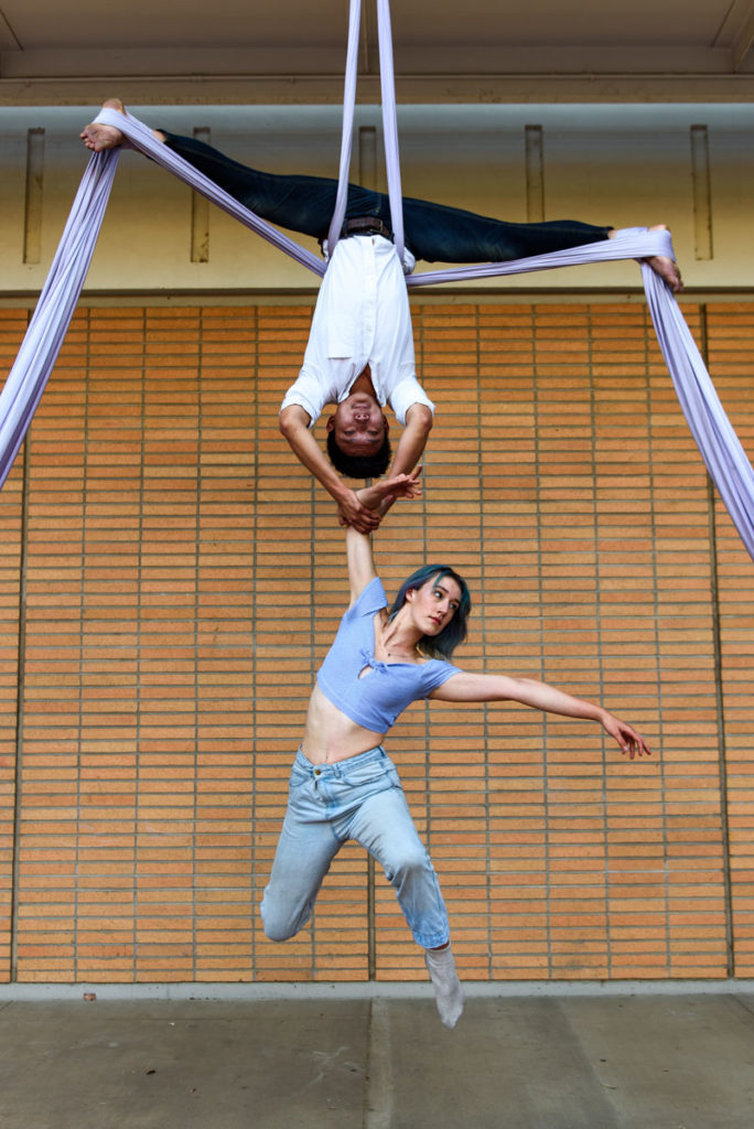 Using aerial silks, Tu hangs upside down and supports a hanging Dubil. The Spring Sing performance will be set to "Heart Cry" by Drehz, and its employment of aerial silks calls for Tu and Shanahan to be intentional in their choice of clothing. (Anika Chakrabarti/Assistant Photo editor)