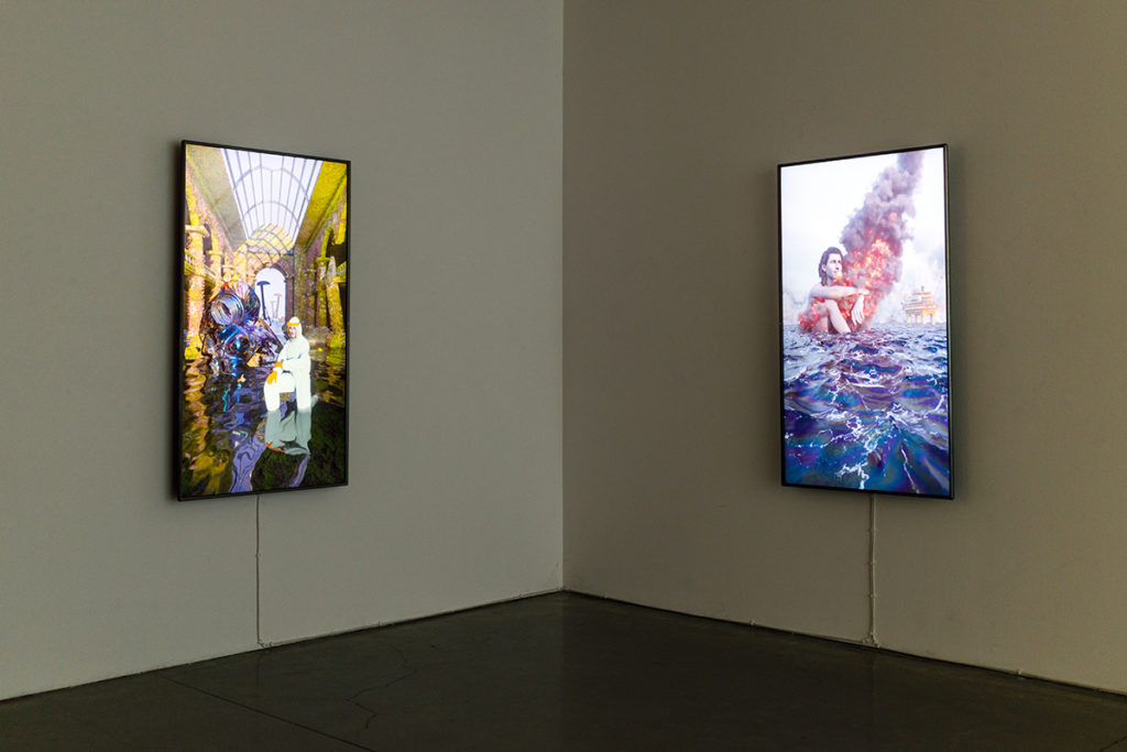 Isaac Ruder’s "Hazard Tourist" is displayed on two screens on opposite walls in the corner of the gallery. "Poetic Realities" features 10 total second-year graduate student artists. (Shengfeng Chien/Daily Bruin)