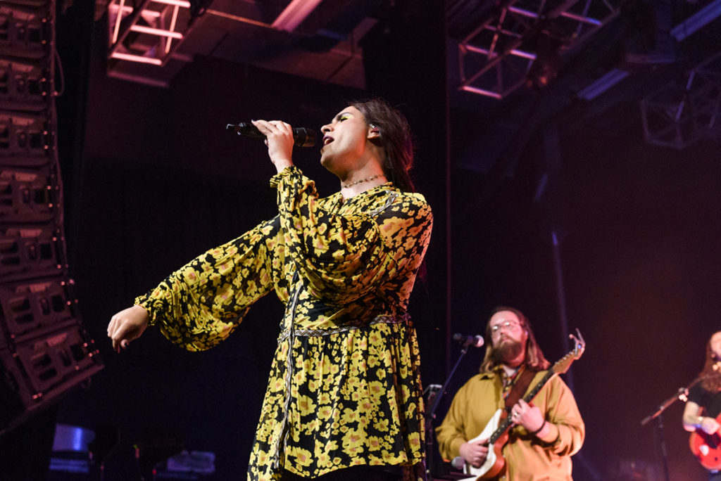 RKS lead singer, Ela Melo belts out in yellow and black floral frock. Through a dynamic stage presence and emotion-filled vocals, Melo kept the crowd's spirits high. (Vivian Xu/Daily Bruin senior staff)