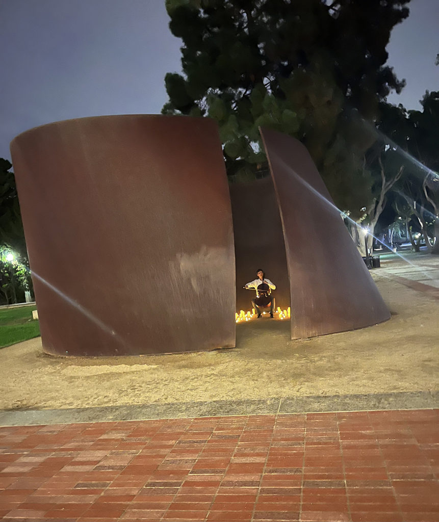 Lysy plays at the center one of Richard Serra&squot;s "Torqued Ellipses." Lysy said the choice of the sculpture as a concert location originated from his desire to bring his music to abstract, unconventional spaces. (Courtesy of the Herb Alpert School of Music)