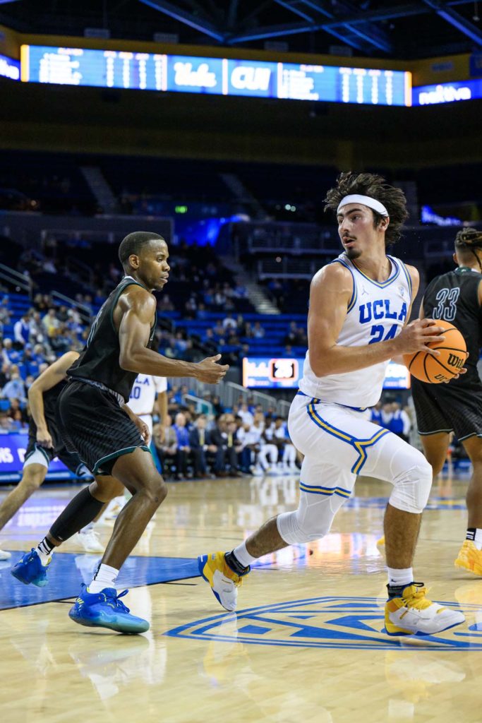 Jaquez backs down a defender in the post. (Jason Zhu/Daily Bruin staff)