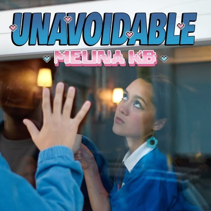 Dressed in blue, Melina KB touches her hand against her reflection on the cover for her most recent single "Unavoidable." (Courtesy of Melina KB)