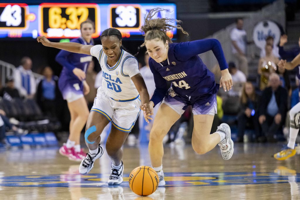 Senior guard Charisma Osborne fights for possession. The Bruins' leading scorer sustained a shoulder injury during the matchup at Oregon and missed the subsequent game at Oregon State.