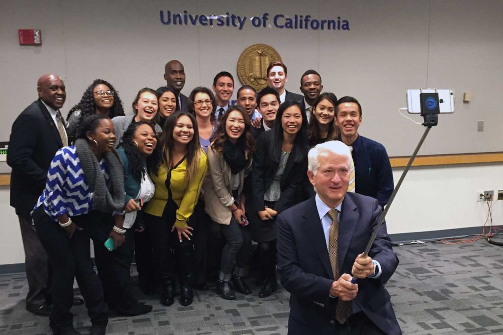 Pictured is Block surrounded by UCLA students. (Courtesy of UCLA Media Relations)