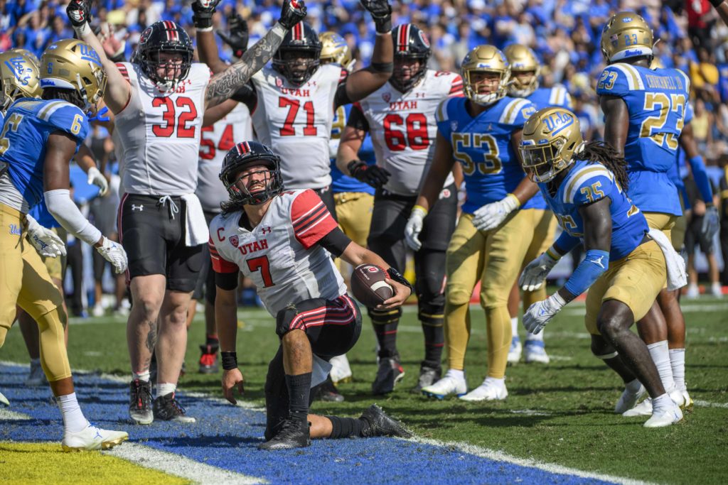 Utah quarterback Cameron Rising kneels in the end zone after scoring a touchdown. Rising’s availability in Saturday’s game is uncertain as he recovers from an ACL tear.