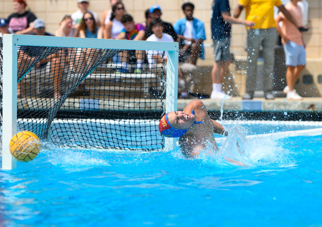 Senior goalkeeper Garret Griggs squints after making a save at Spieker Aquatics Center. Griggs made 11 saves each in games against Cal and Stanford. (Julia Zhou/Assistant Photo editor)