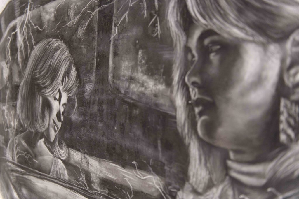 Colby Golightly's “Conversation with Marilyn” is a charcoal illustration of the eponymous actress and Hollywood icon. The third-year art student said they hope to inspire compassion in the hearts of onlookers. (Anna Dai-Liu/Daily Bruin senior staff)