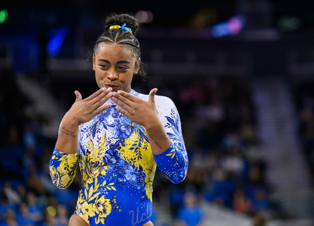 Harris performs choreography during her floor routine at Pauley Pavilion. (Jeremy Chen/Photo editor)