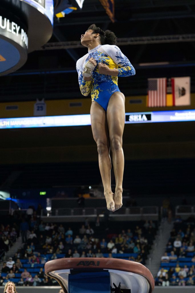 Anyimi twists in the air as she competes her Yurchenko full at Pauley Pavilion. (Myka Fromm/Photo editor)