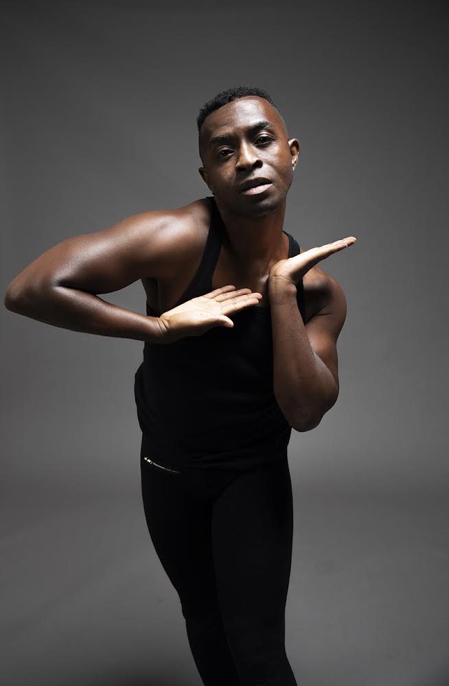 Dancer and choreographer Bernard Brown gazes at the camera while making contemporary movements. The UCLA alumnus said they will perform a three-minute solo routine at "Prelude to ... JUNETEENTH DAY CELEBRATION." (Courtesy of David B. Arenas)