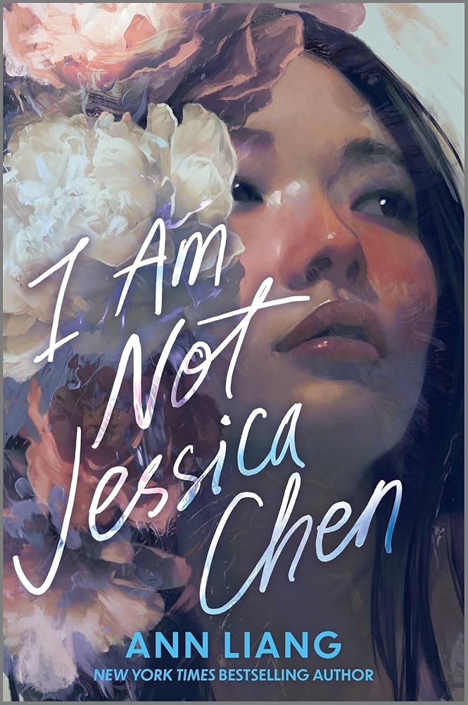 The cover of Ann Liang's 'I Am Not Jessica Chen' is shown with a woman beside a bouquet of ⁣flowers. The novel details the story of Jenna Chen's wish to become as triumphant as her cousin, Jessica.