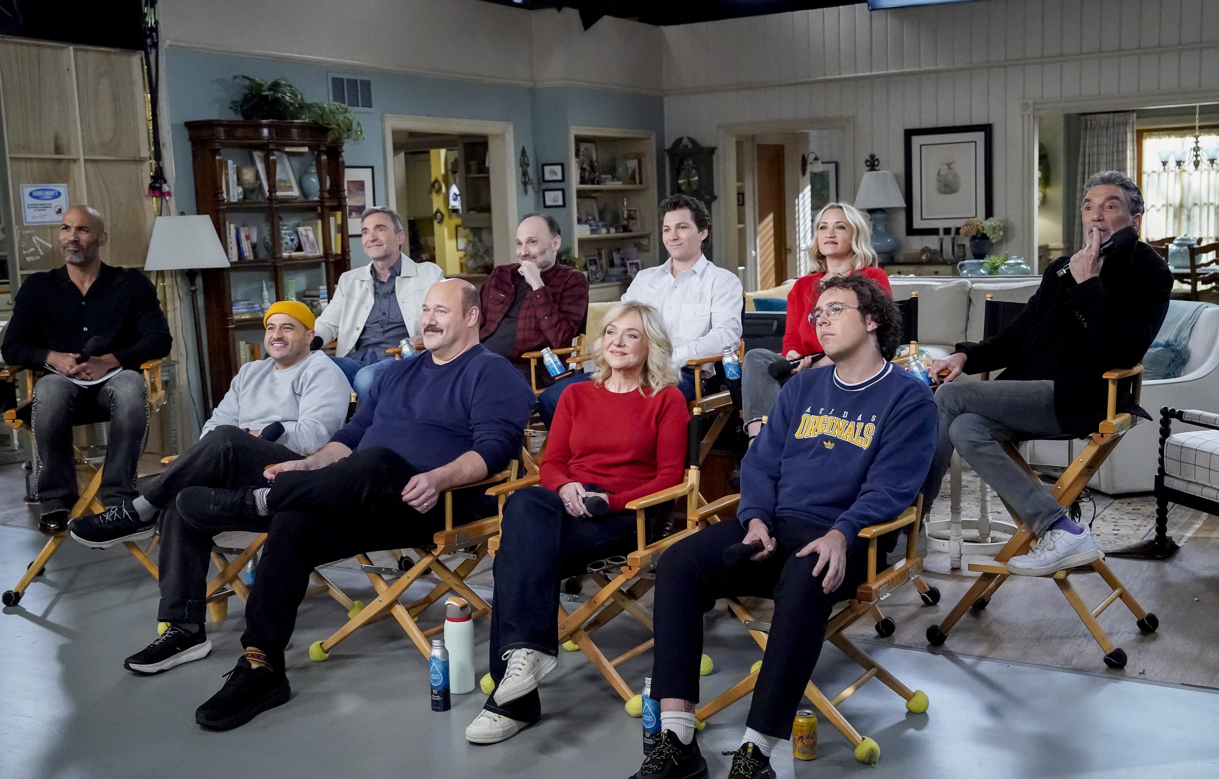 The cast and crew of "Georgie & Mandy&squot;s First Marriage" sit and face a group of journalists while on the sitcom&squot;s set. The show is in its first season and is part of the broader television universe that includes characters from "Young Sheldon" and "The Big Bang Theory." (Courtesy of Warner Bros. TV / Evans Vestal Ward)