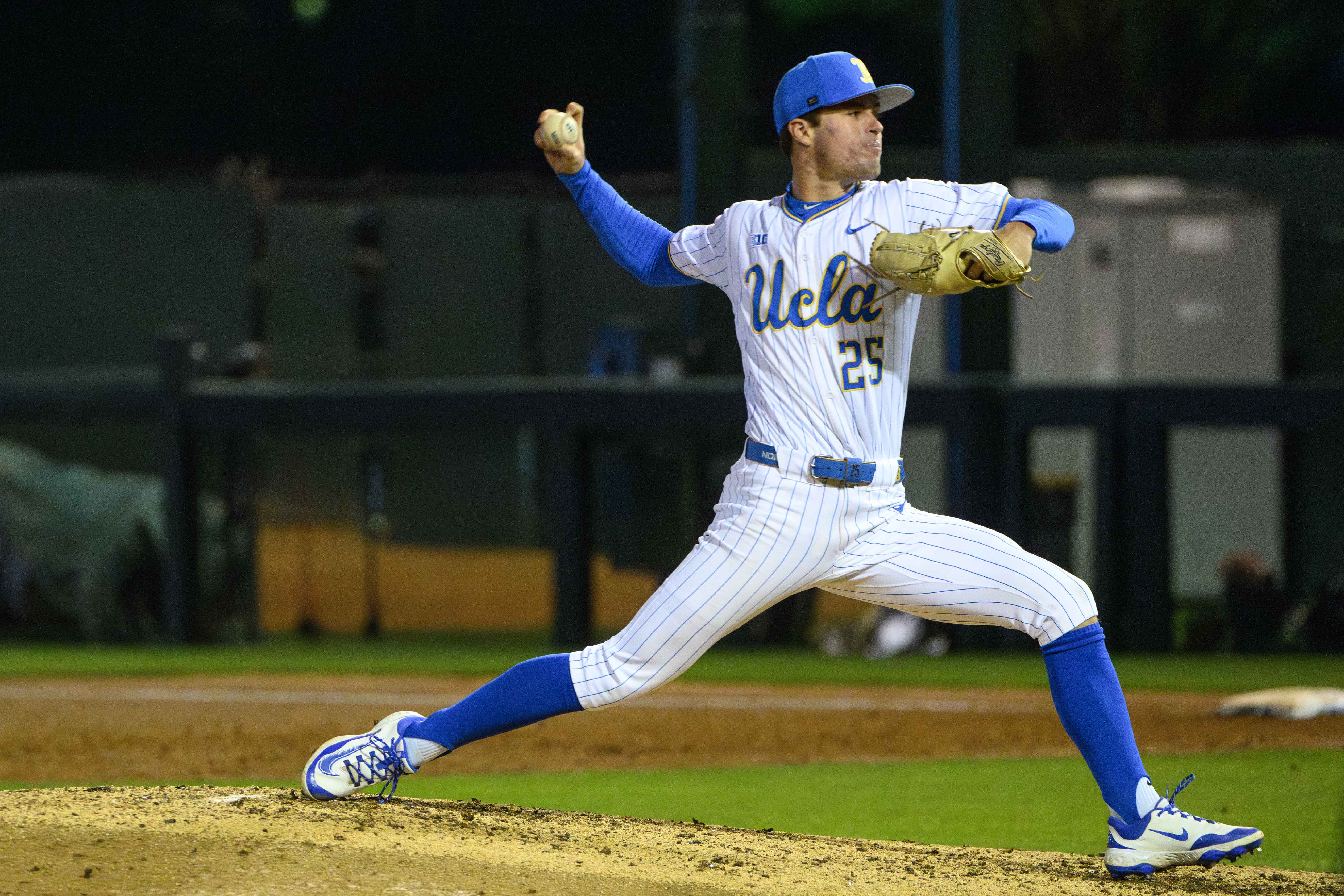 CJ Bott throws a knuckle curve at Jackie Robinson Stadium. The freshman right-hander, plus the rest of the Bruin bullpen, held the Commodores scoreless over the final six innings of the ballgame. (Michael Gallagher/Assistant Photo editor)