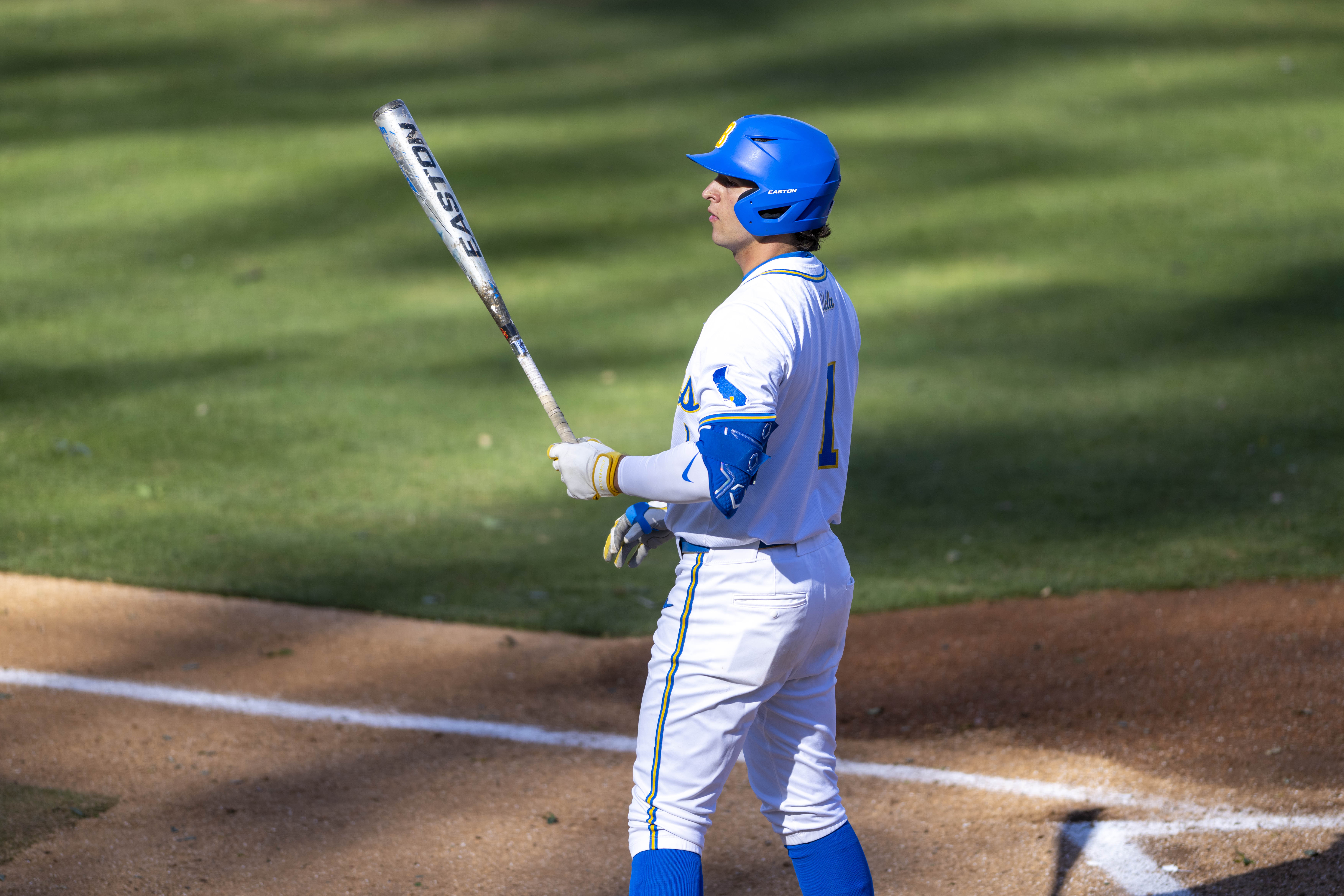Roch Cholowsky stares at his bat while standing just outside the right-handed batter's box. The sophomore shortstop has a 1.217 OPS this season – tied for the 12th best among Big Ten hitters. (Aidan Sun/Assistant Photo editor)