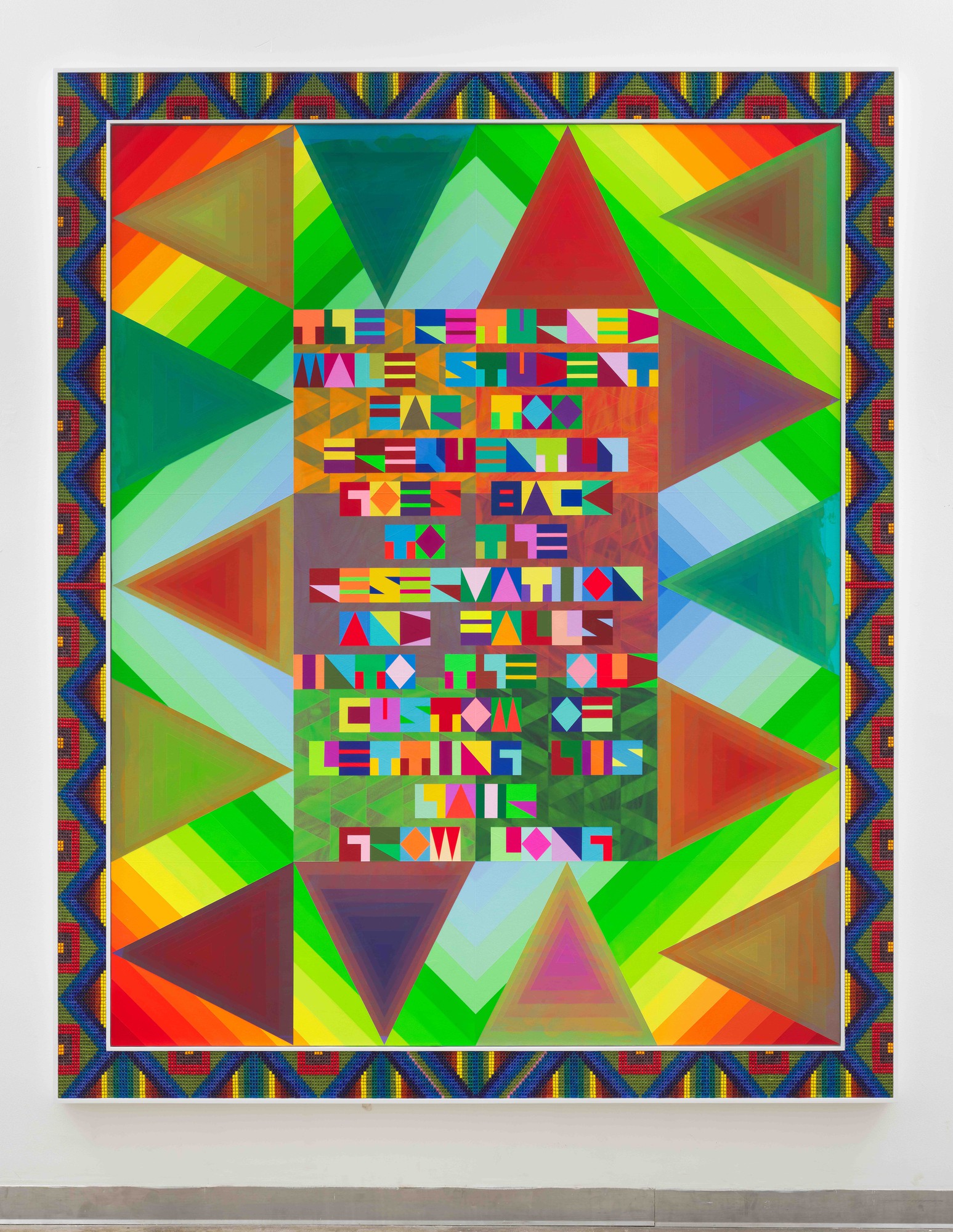 Jeffrey Gibson&squot;s "THE RETURNED MALE STUDENT FAR TOO FREQUENTLY GOES BACK TO THE RESERVATION AND FALLS INTO THE OLD CUSTOM OF LETTING HIS HAIR GROW LONG" is pictured. The 2024 piece uses acrylic on canvas, glass beads, plastic beads and a custom wooden frame, and is one of more than 30 pieces of Gibson&squot;s work on view in The Broad&squot;s "Jeffrey Gibson: the space in which to place me" exhibit, coming May 10. (Courtesy of Jeffrey Gibson Studio and Max Yawney)