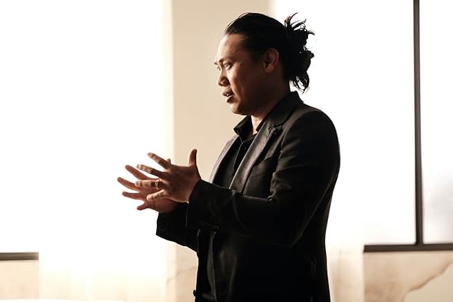 Pictured is Jon M. Chu talking while gesturing with his hands. The director gave a talk at the LA Times Festival of Books this Sunday. (Courtesy of Eddy Chen)