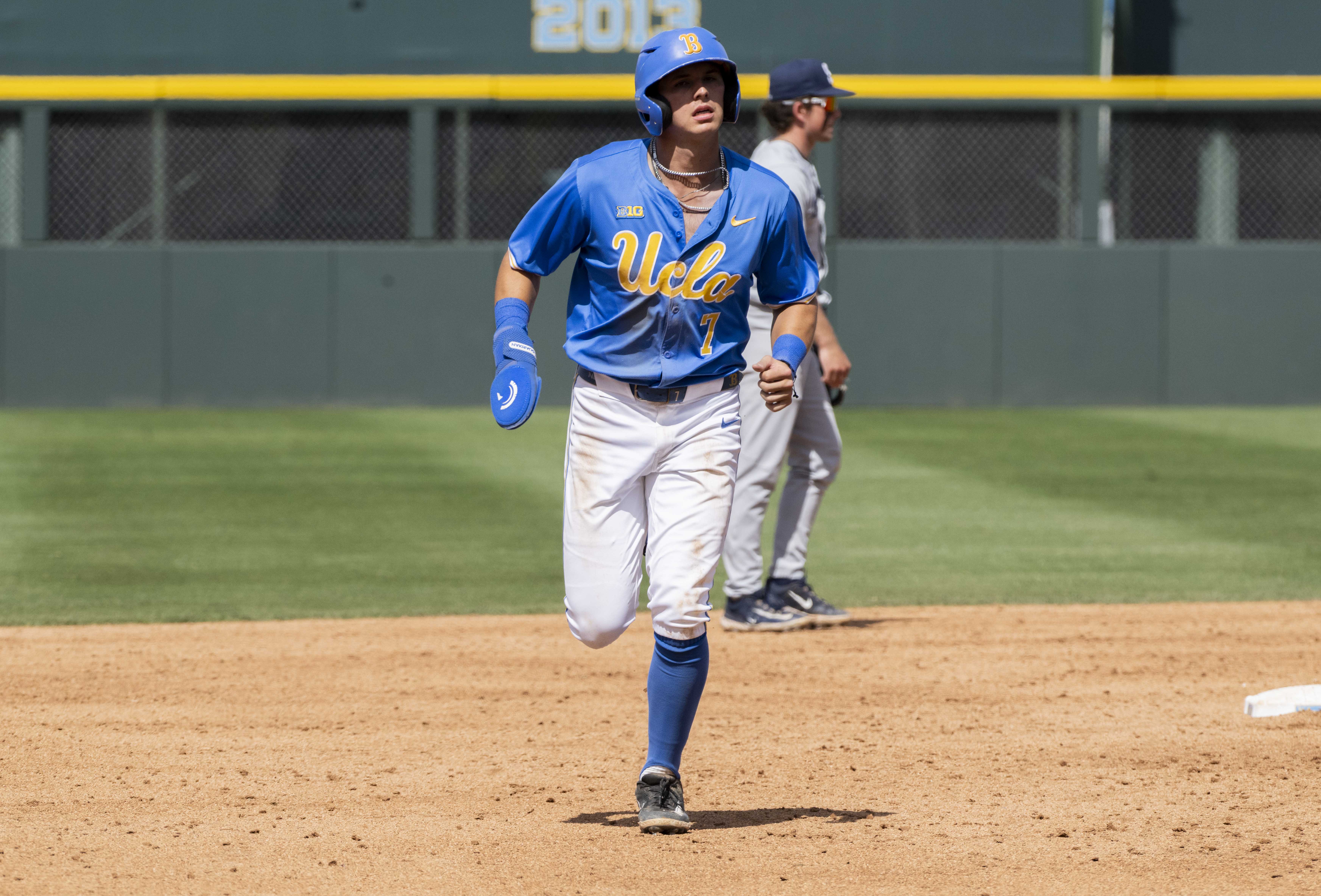 Sophomore third baseman Roman Martin rounds second and heads to third. (Rohan Ramalingam/Daily Bruin)