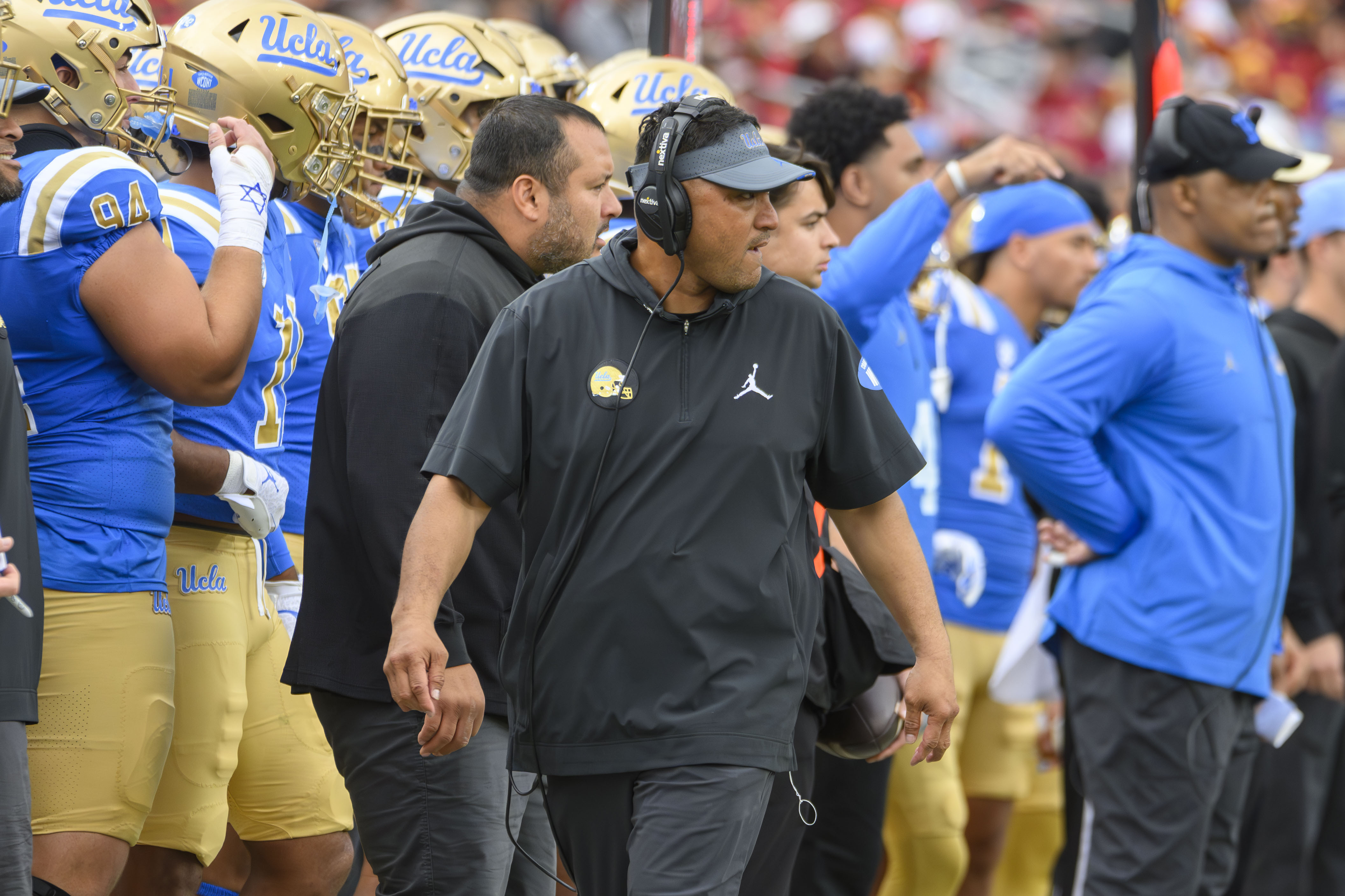 Malloe walks along the sideline. (Daily Bruin file photo)