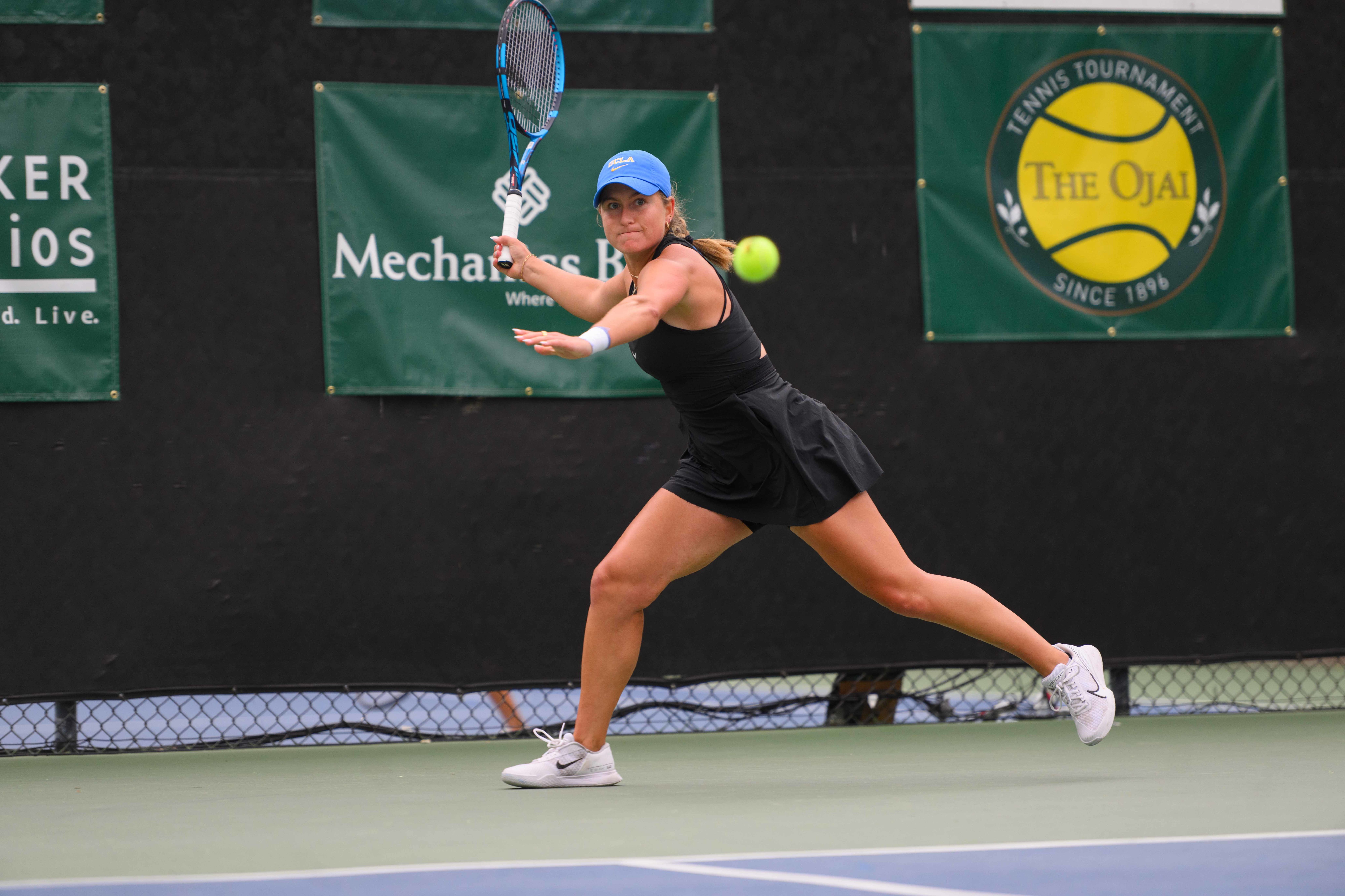 No. 31 junior Anne-Christine Lutkemeyer races to forehand a ball at Libbey Park in Ojai, California. (Brianna Carlson/Daily Bruin staff)