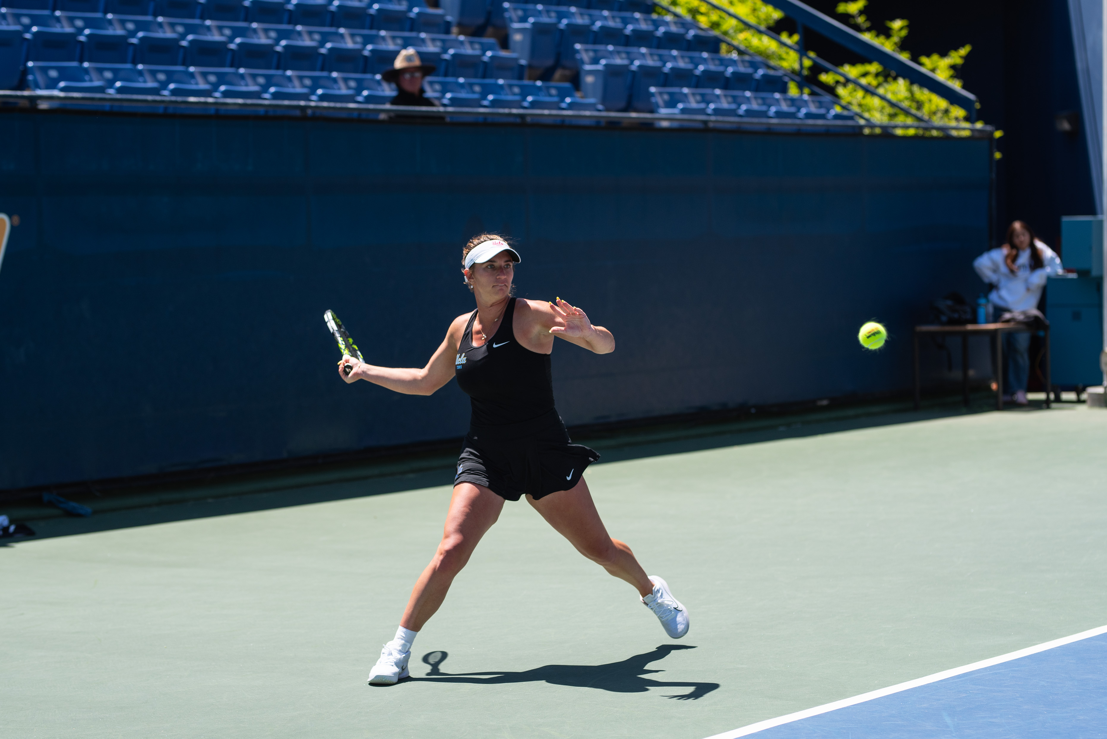 No. 93 senior Kimmi Hance begins to swing at an approaching ball. (Edward Ho/Daily Bruin)