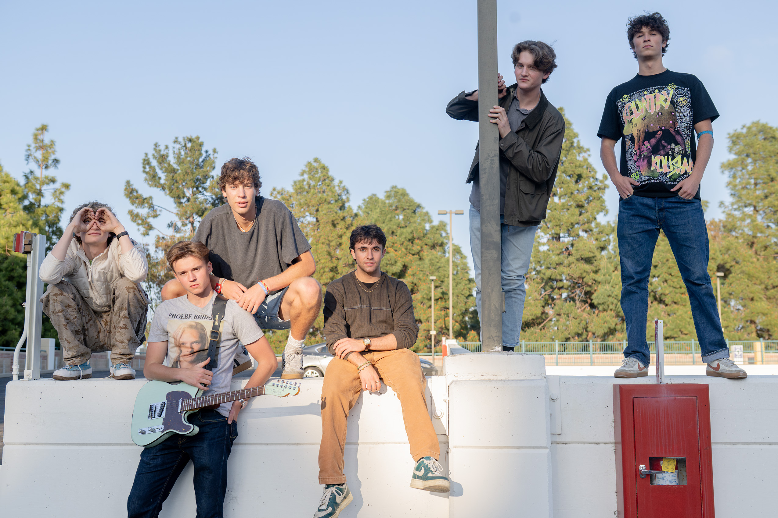 The 529s pose for a photo while on the roof of a parking garage. Second-year cognitive science student Kiva Schweig said the band&squot;s song "Get Me On The Way" invokes influences including The Beatles, John Mayer and Lynyrd Skynyrd. (Karla Cardenas-Felipe/Daily Bruin staff)