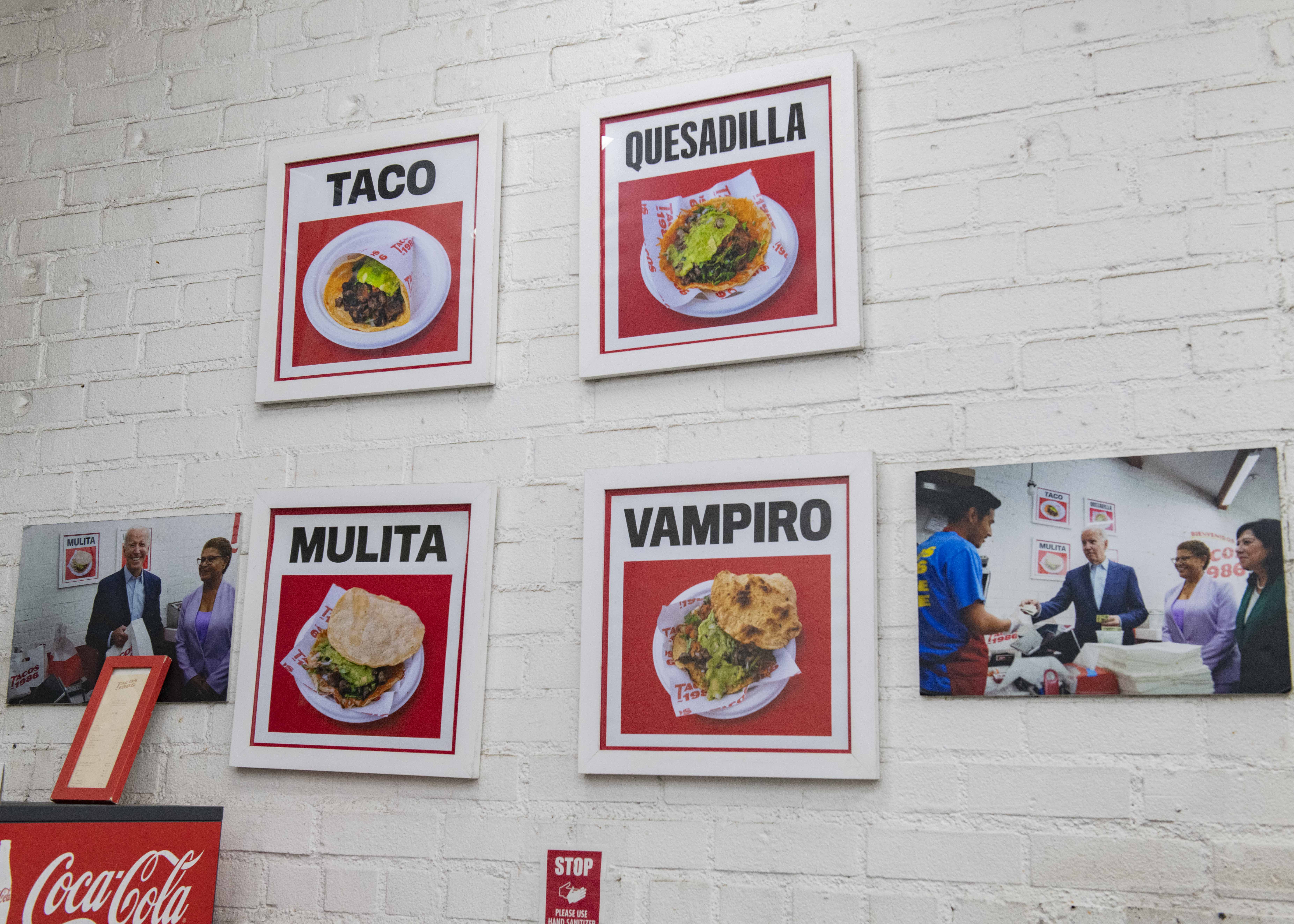 Photographed art is pictured on the interior walls of Tacos 1986. The establishment's patrons said despite the price of the food, the meals are still of quality. (Ruby Galbraith/Daily Bruin)