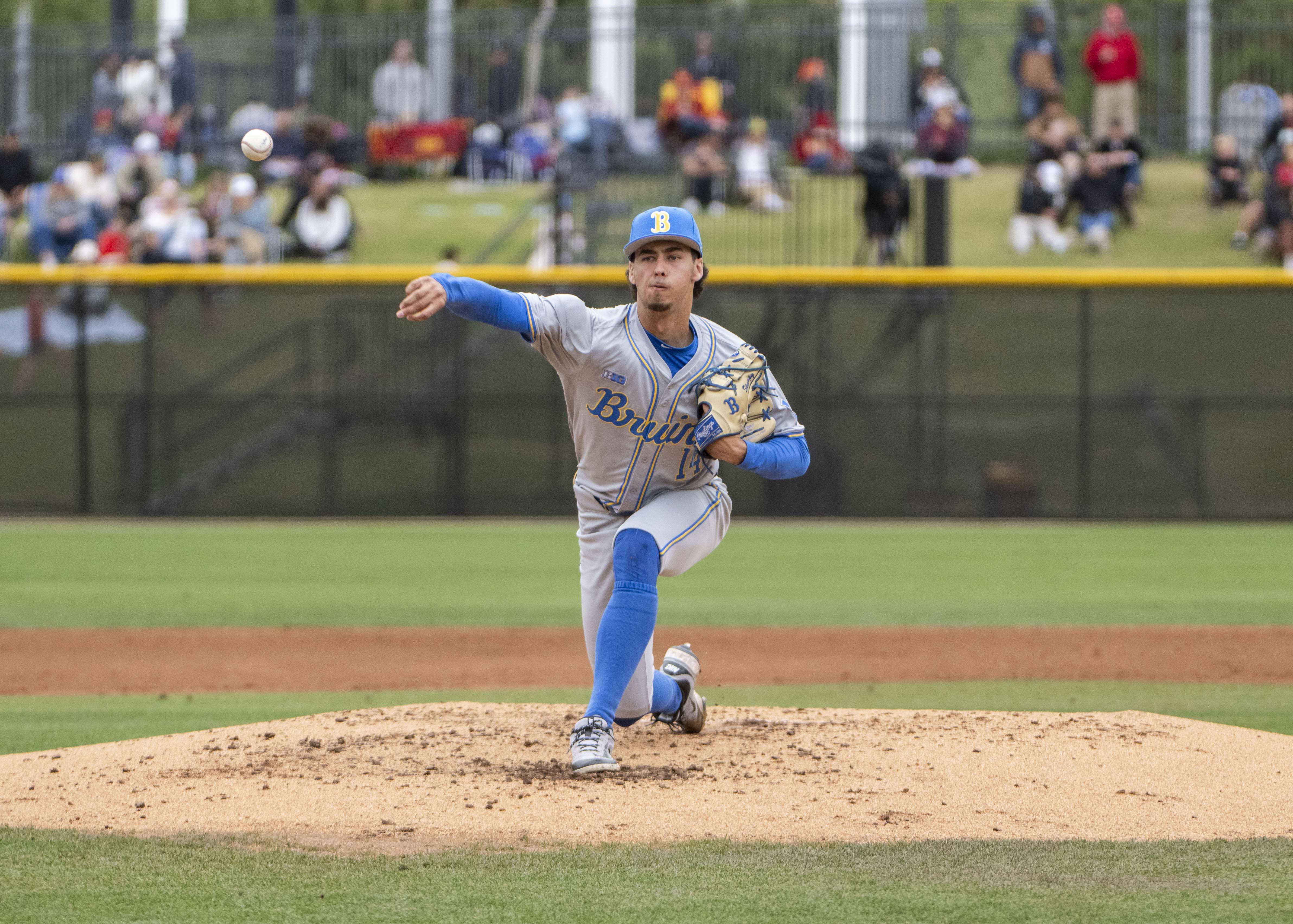 Sophomore right-hander Landon Stump pitches at Great Park in Irvine. (Jeannie Kim/Daily Bruin senior staff)