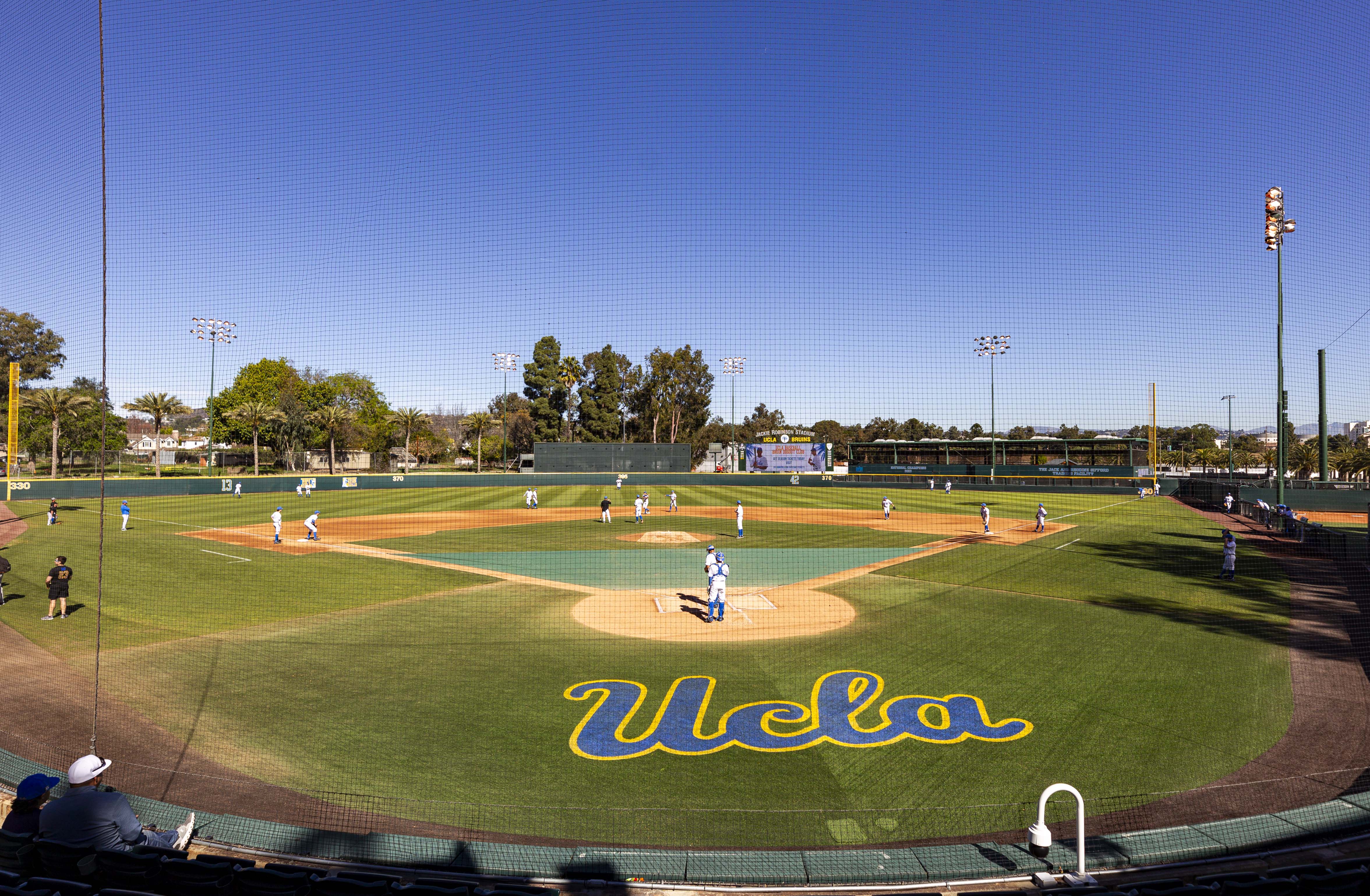 The Bruins warm up on defense at Jackie Robinson Stadium before a game. (Daily Bruin file photo)