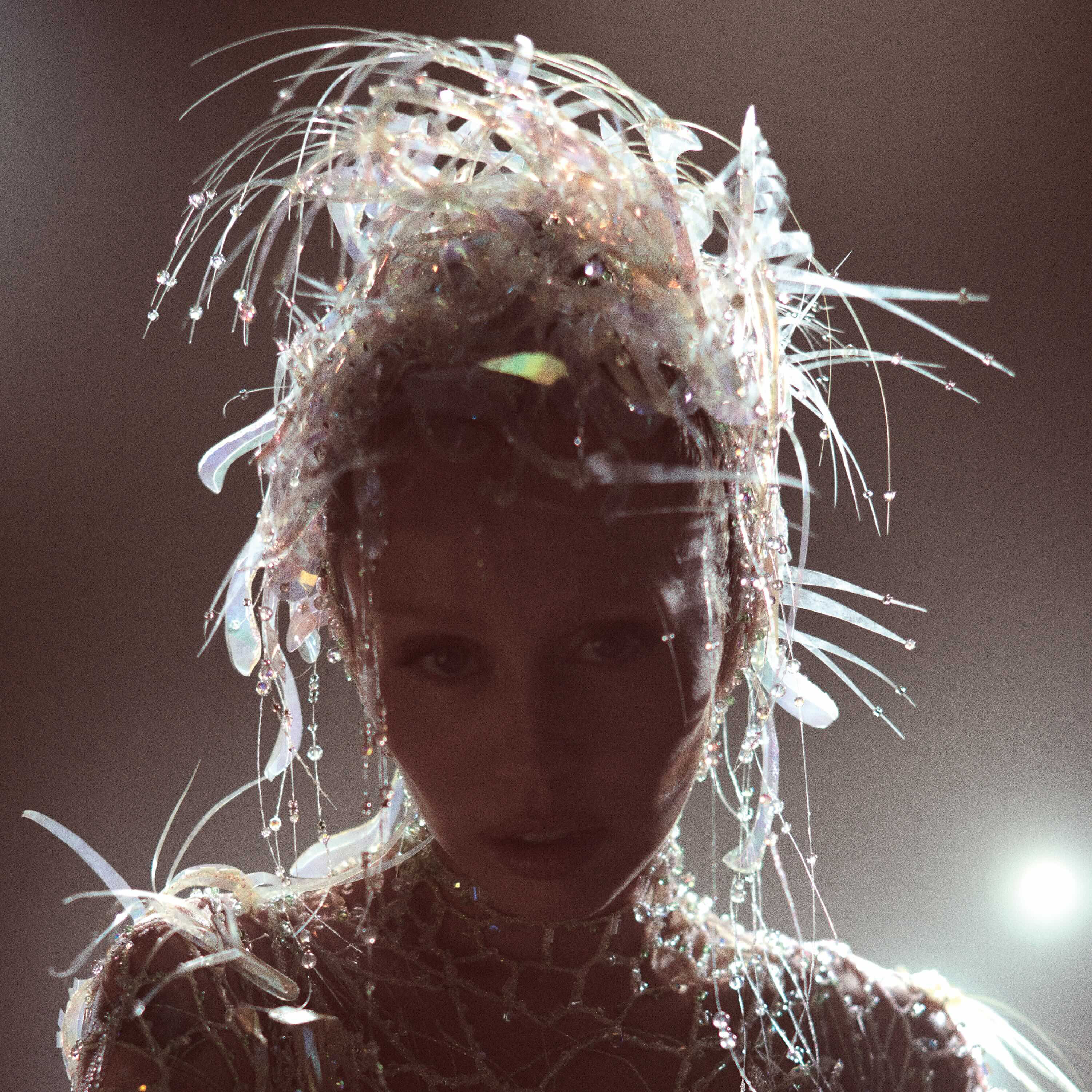A silhouette of Miley Cyrus’ head and shoulders while she wears an ethereal white costume is the cover for the artist&squot;s album “Something Beautiful.” The 13-track LP was released May 30 and includes the song "Easy Lover." (Courtesy of MCEO Inc., under exclusive license to Columbia Records, a Division of Sony Music Entertainment)
