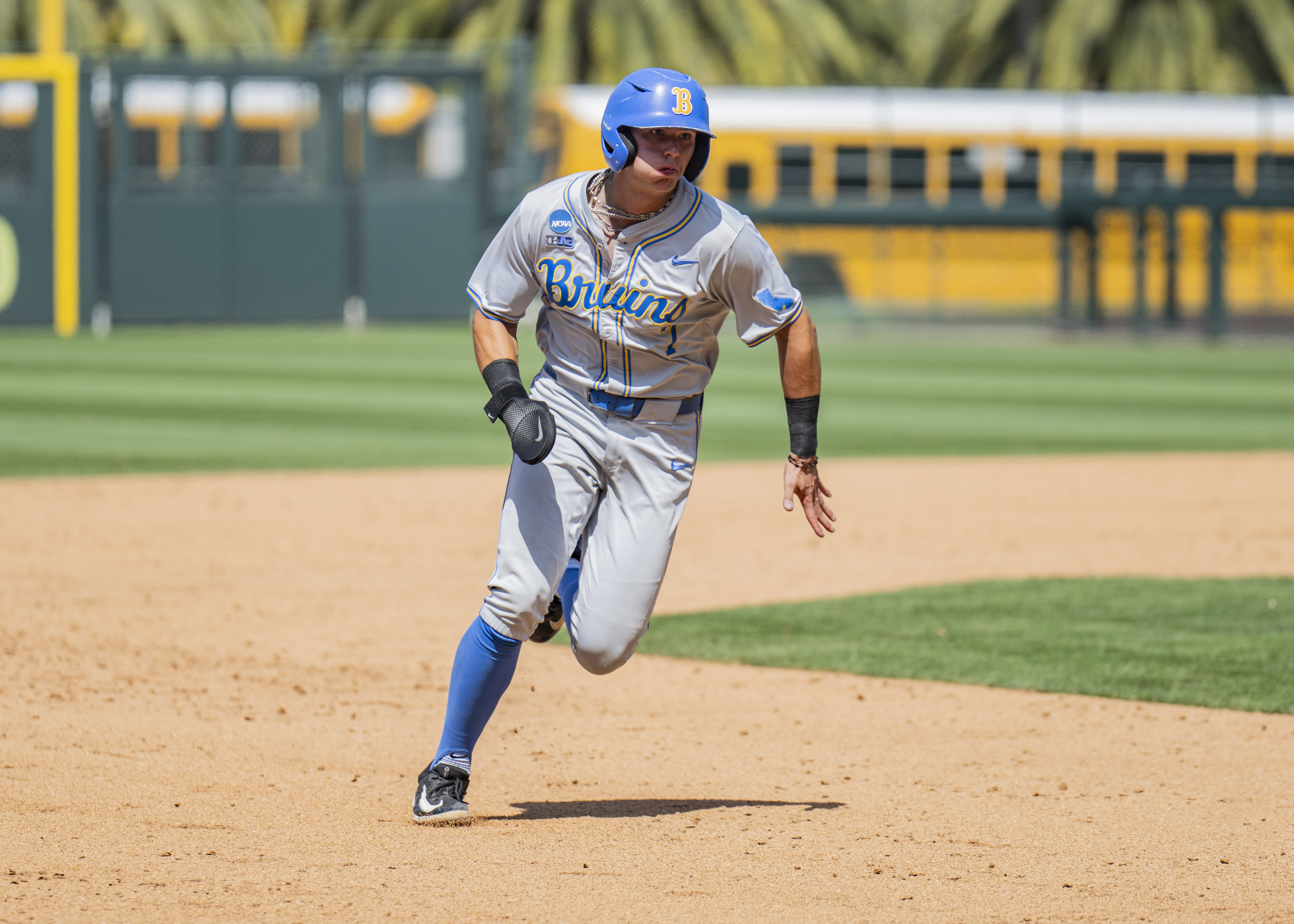Sophomore third baseman Roman Martin heads for third. Martin is slashing .395/.455/.684 this postseason. (Aidan Sun/Assistant Photo editor)