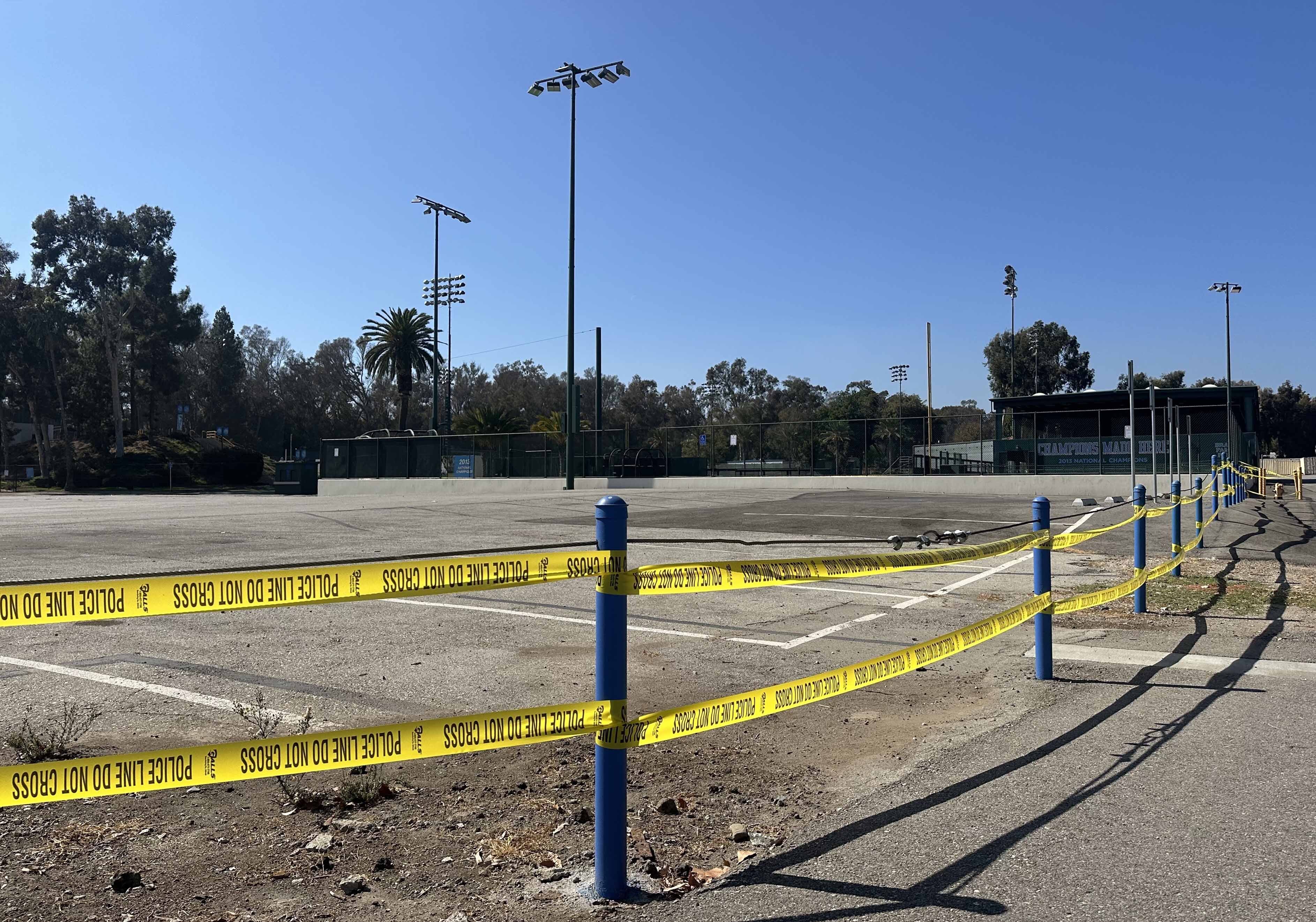 Police tape lines the parking lot of Jackie Robinson Baseball Stadium, the home of UCLA baseball. A federal judge ruled on September 25 that the stadium must close down by the afternoon of the following day, stating that the stadium does not primarily serve veteran interests. (Dylan Winward/Daily Bruin senior staff)