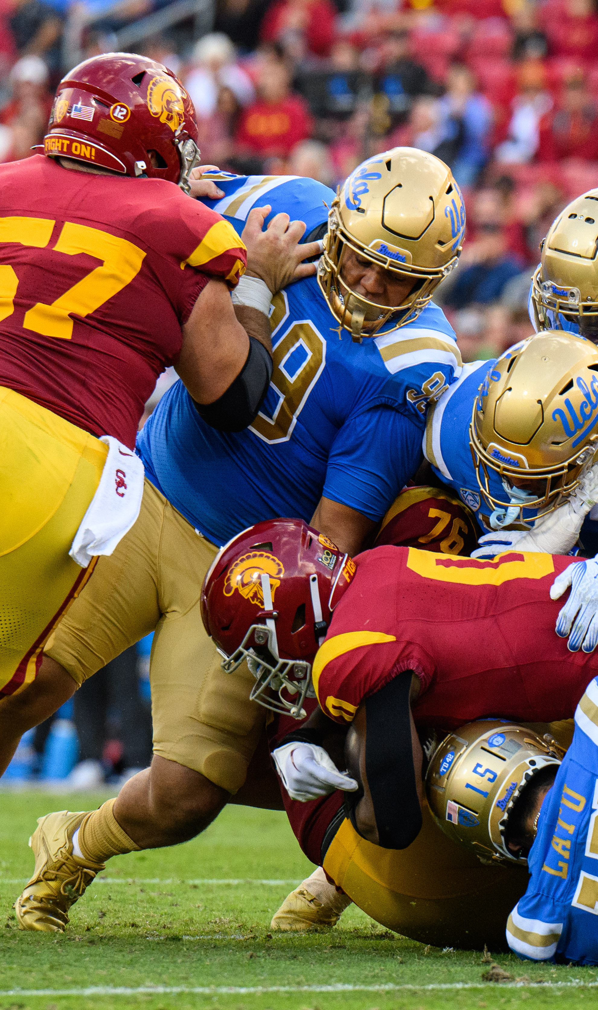 Redshirt senior defensive lineman Keanu Williams helps bring a USC player to the ground. Williams missed the majority of last season due to injury, but made one sack in the 2024 season opener.