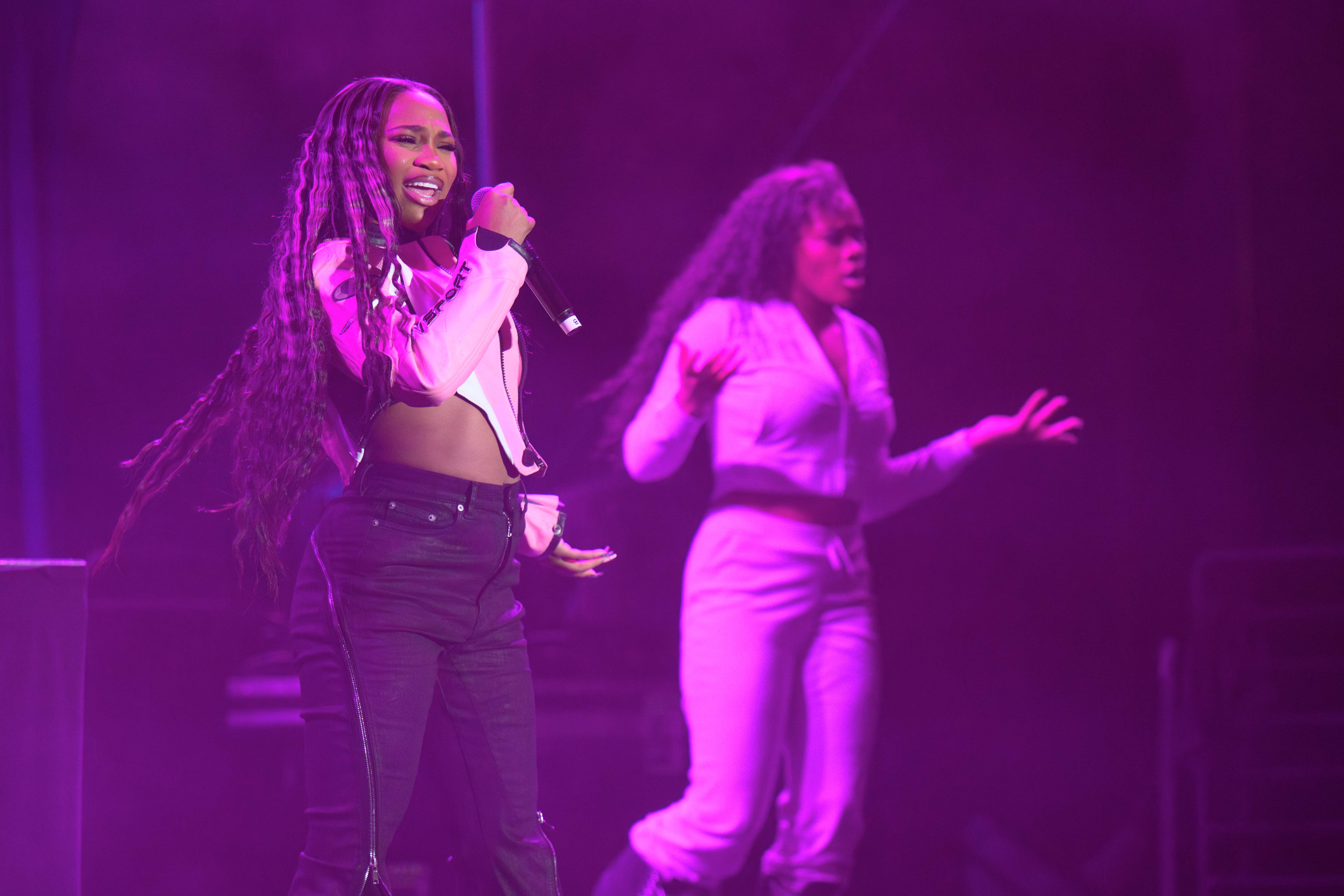 Surrounded by pink lights, BunnaB performs alongside a backup dancer. The rapper performed some of her hits, such as "Bunna Summa," which she played twice in a row. (Selin Filiz/Assistant Photo editor)