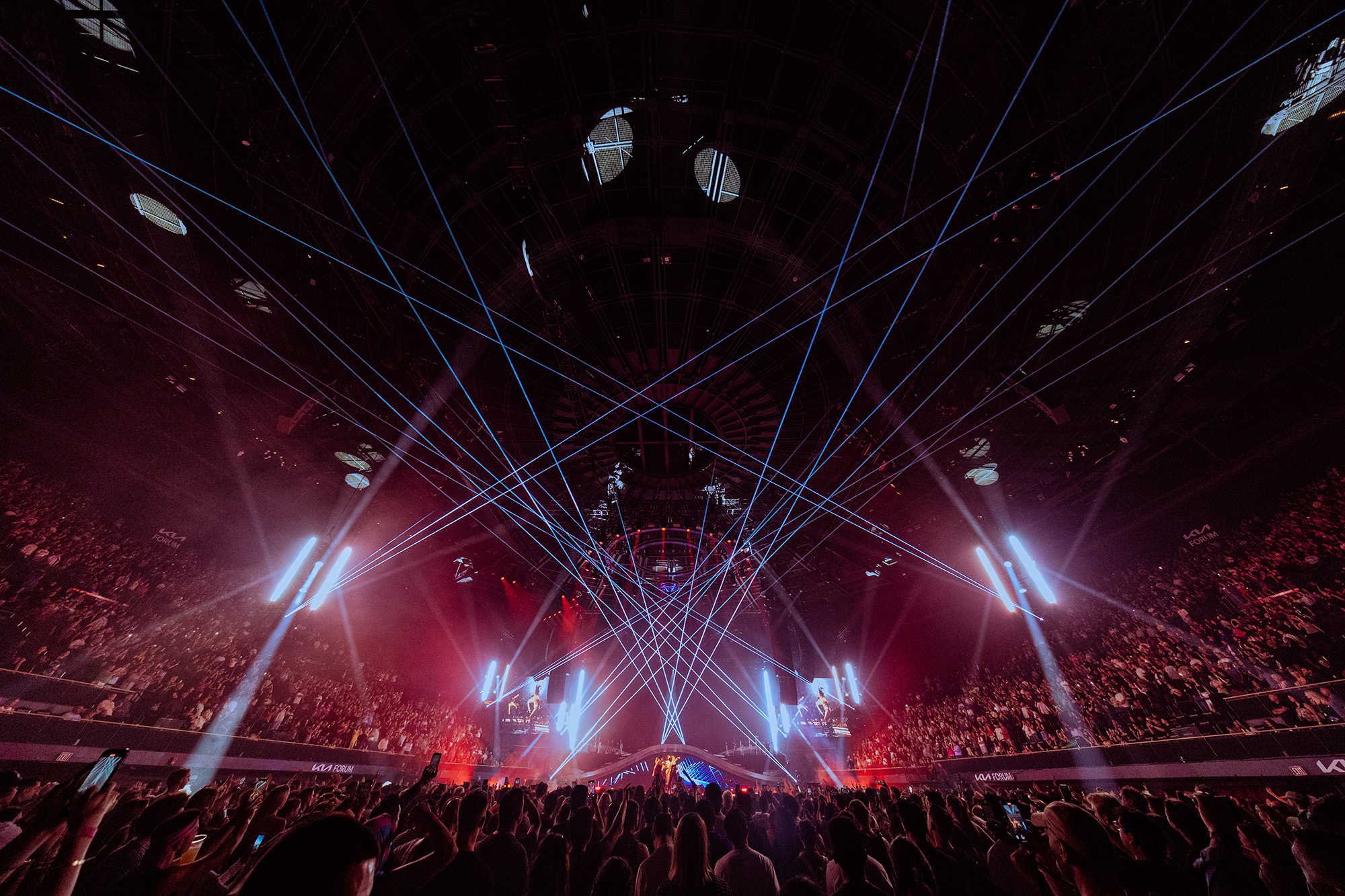 Lipa's stage shows a pattern made by blue strobe lights. The show included a variety of props from LED sticks to confetti cannons, adding edge and movement to the songs. (Courtesy of Madison Phipps)