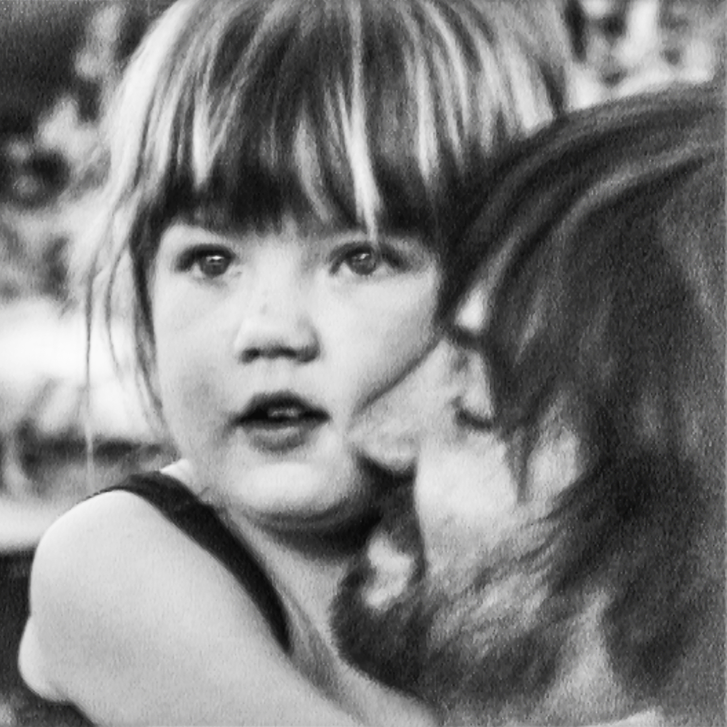 Album cover of “Deadbeat” shows a black-and-white photo of Kevin Parker and his daughter. Releasing Oct. 17, Tame Impala’s fifth studio album is expected to incorporate themes of Australian rave culture, according to a Sony Music press release. (Courtesy of Grandstand Media, Columbia Records)