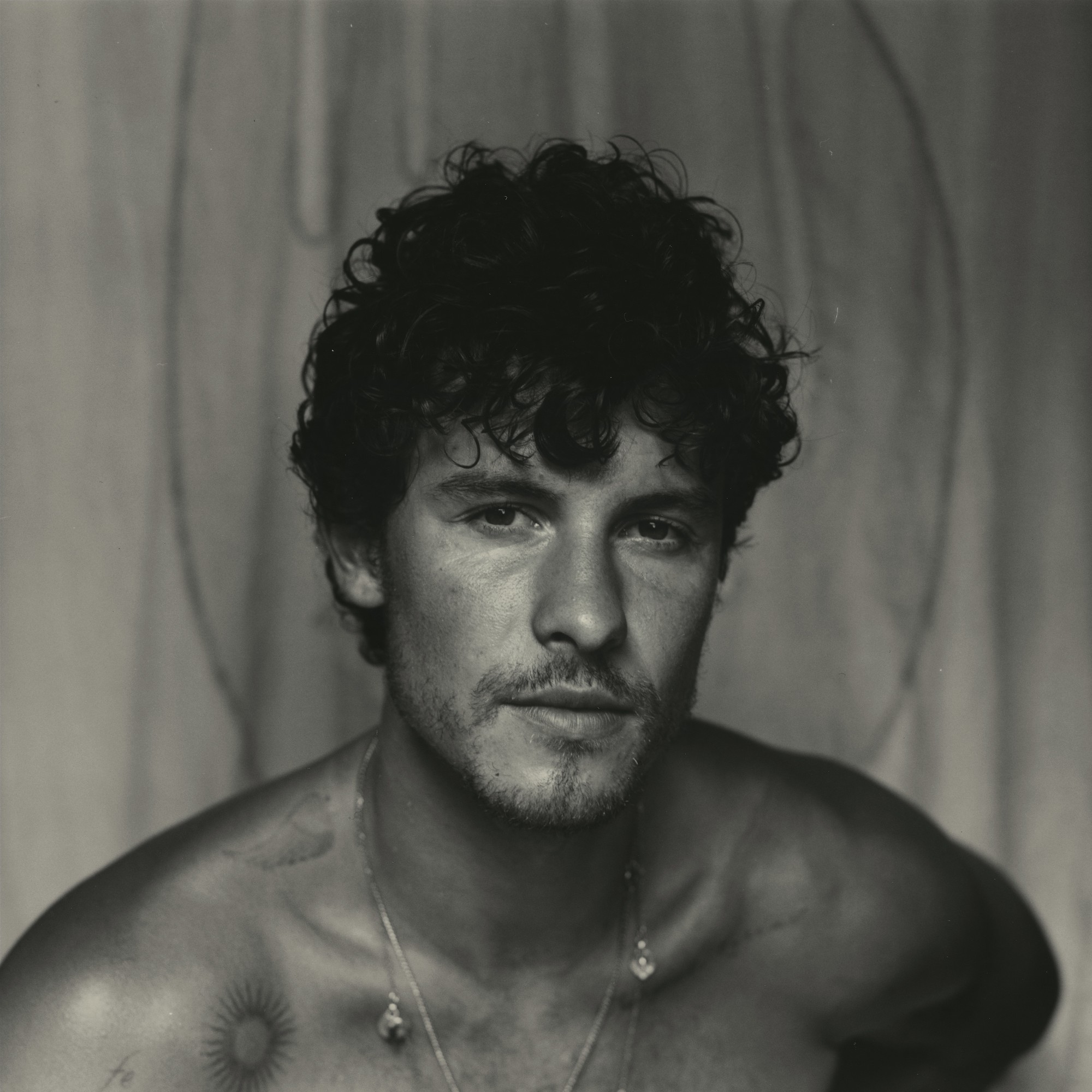 Cover of Shawn Mendes&squot; 2024 release "Shawn" shows a black and white photo of the singer. Mendes&squot; tour "On The Road Again" is making a stop in Los Angeles on Oct. 17, featuring tracks across his decade-long discography. (Courtesy of Island Records, a division of UMG Recordings, Inc.)