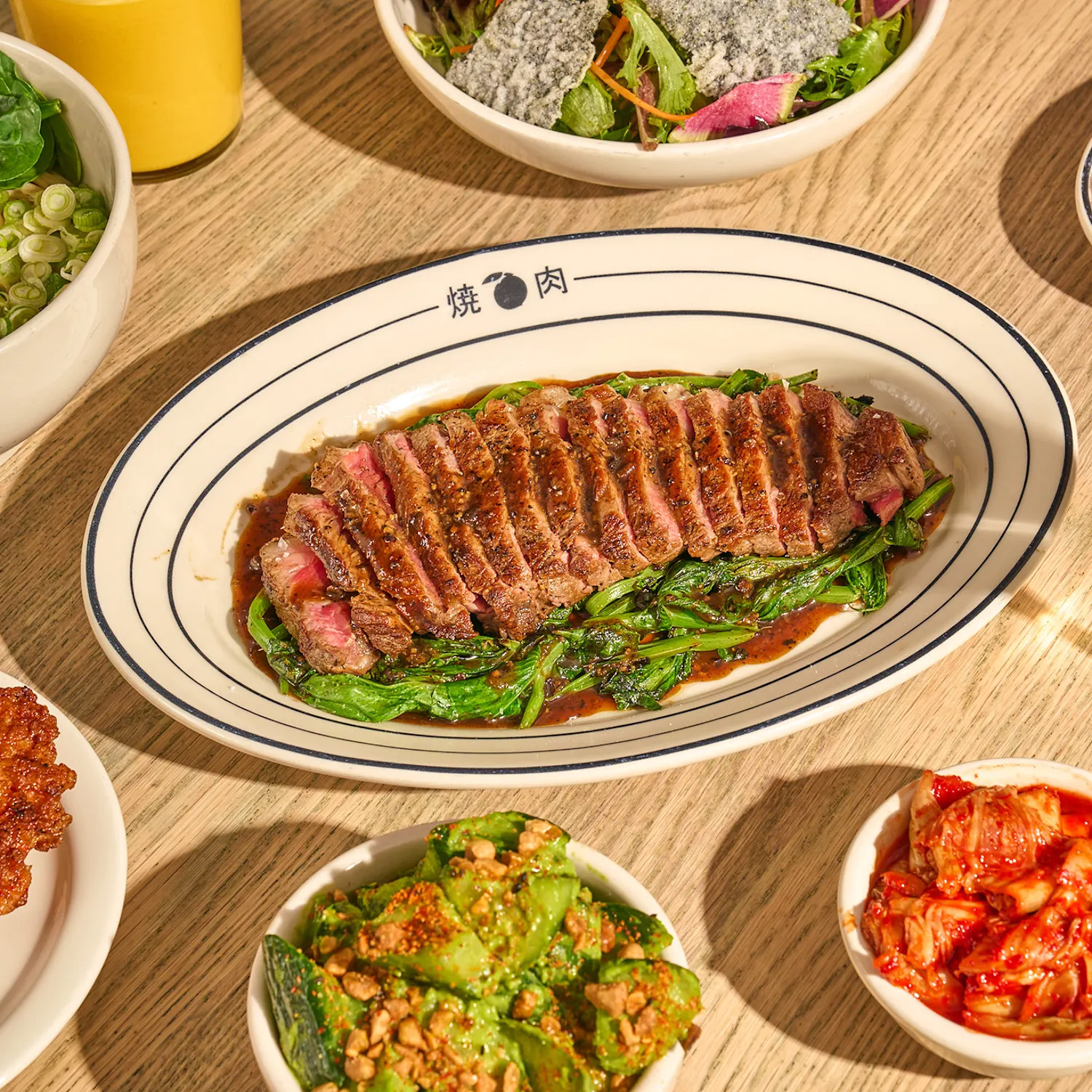 Shown are several dishes from restaurant Super Peach. The Momofuku endeavor will open in Century City in late October, bringing the restaurant group’s classic Asian-American flavors to the Westfield mall. (Courtesy of Super Peach)