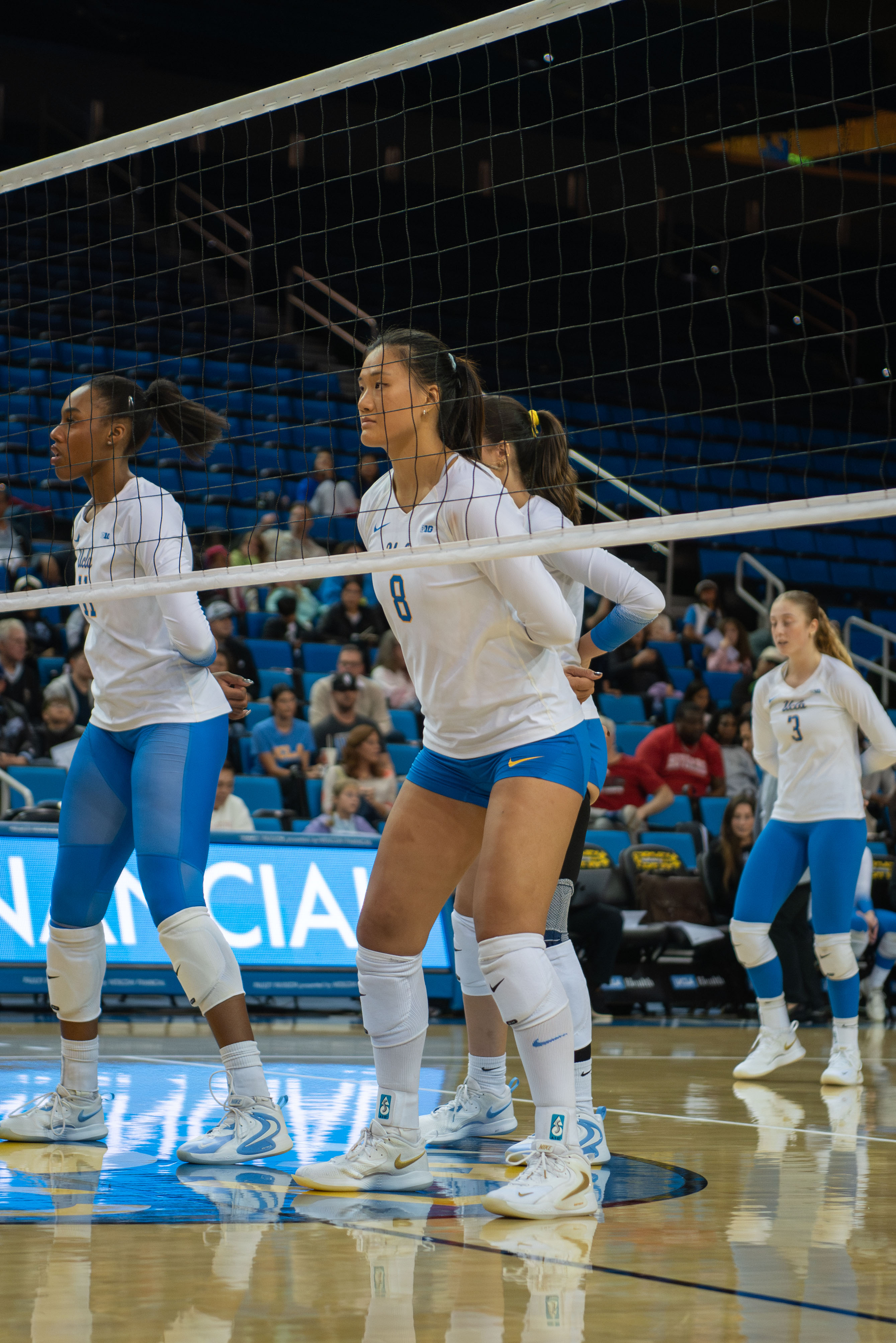 Junior outside hitter Maggie Li stands at the net ready in serve receive position. (Karla Cardenas-Felipe/Daily Bruin staff)