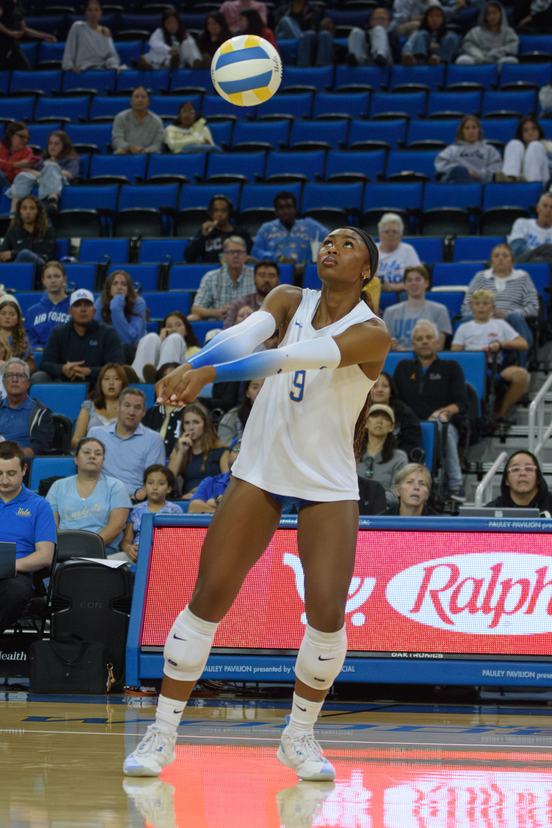Senior outside hitter Cheridyn Leverette bump passes the ball. (Brianna Carlson/Daily Bruin staff)