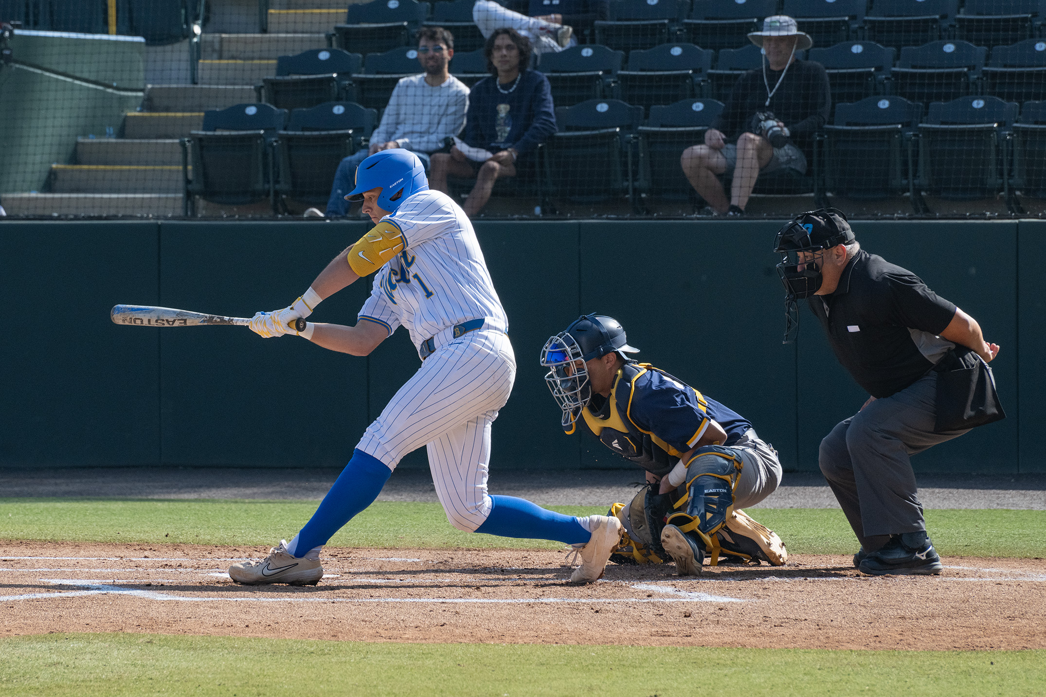 Junior shortstop Roch Cholowsky swings at a pitch. (Kai Dizon/Daily Bruin senior staff)