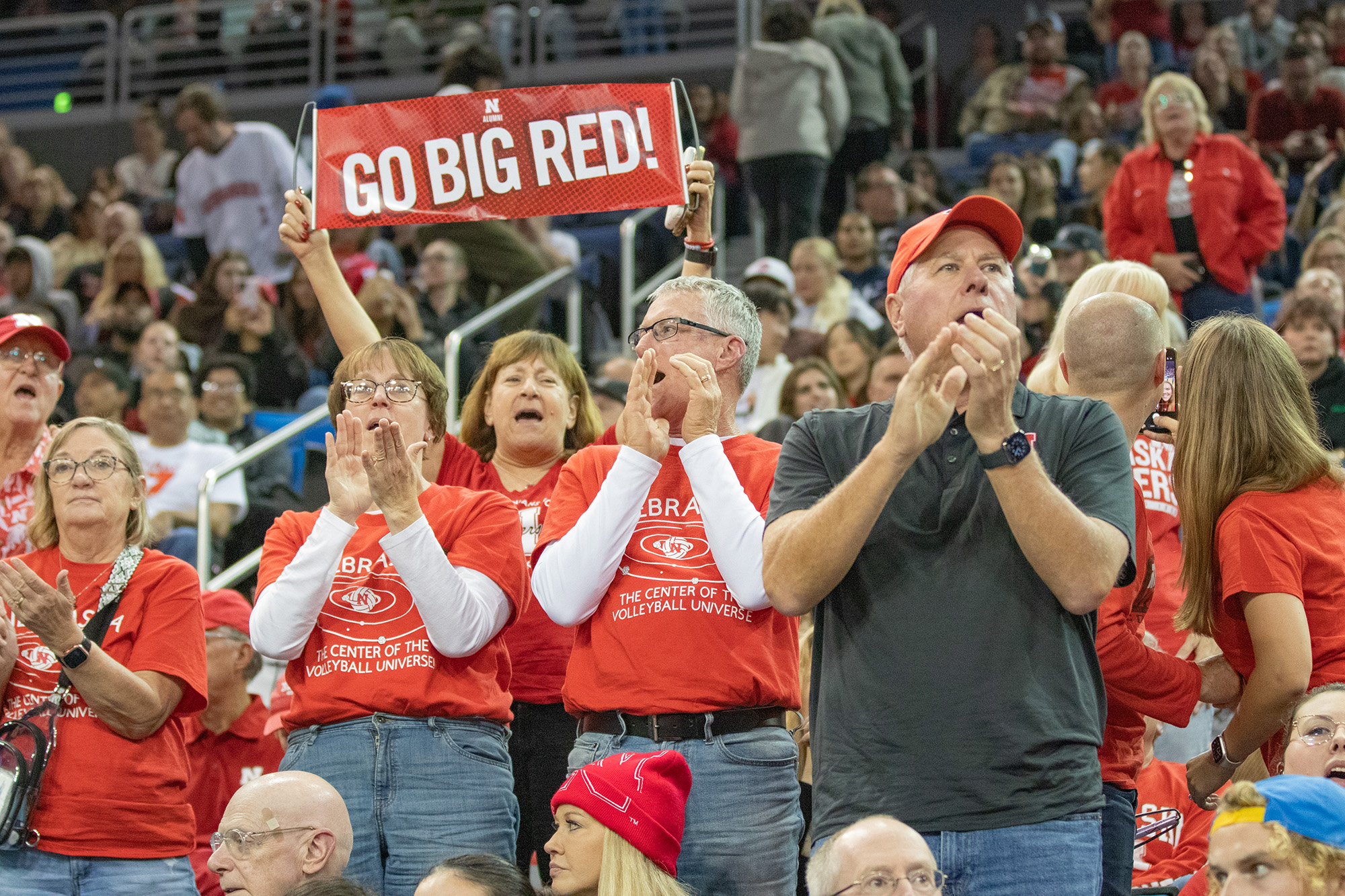 Nebraska volleyball fans cheering for the Cornhuskers. (Brianna Carlson/Daily Bruin staff)